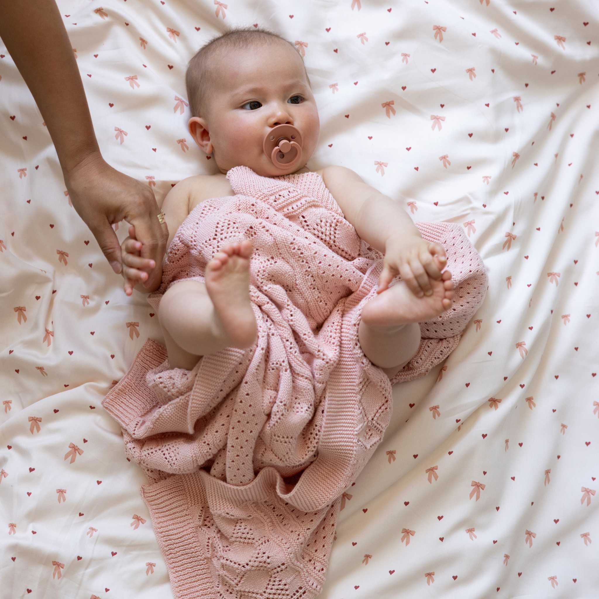 Baby Wrapped In Cam Cam Pointelle Blanket - Sorbet