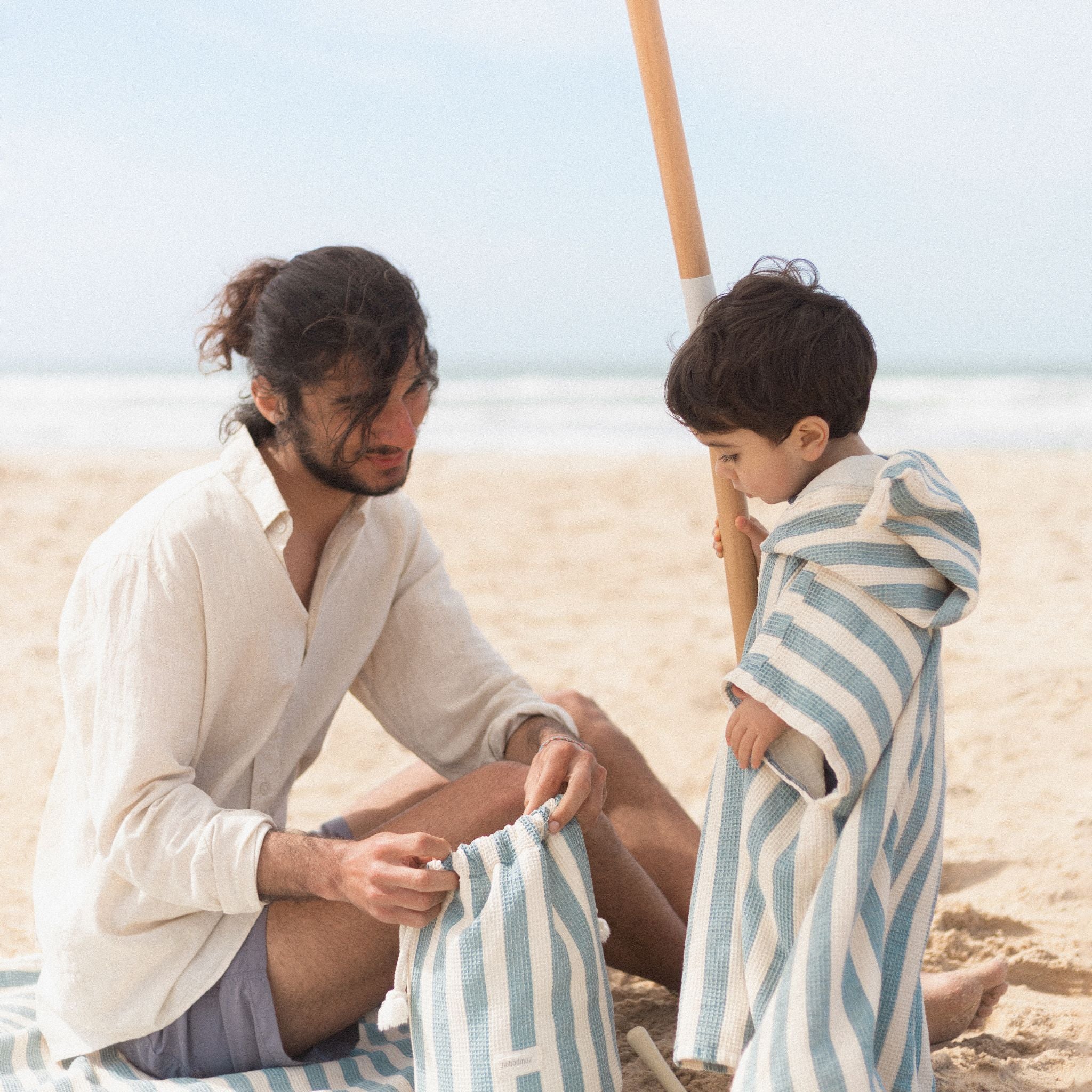 Little Boy in Nobodinoz Portofino Beach Poncho Blue Stripes