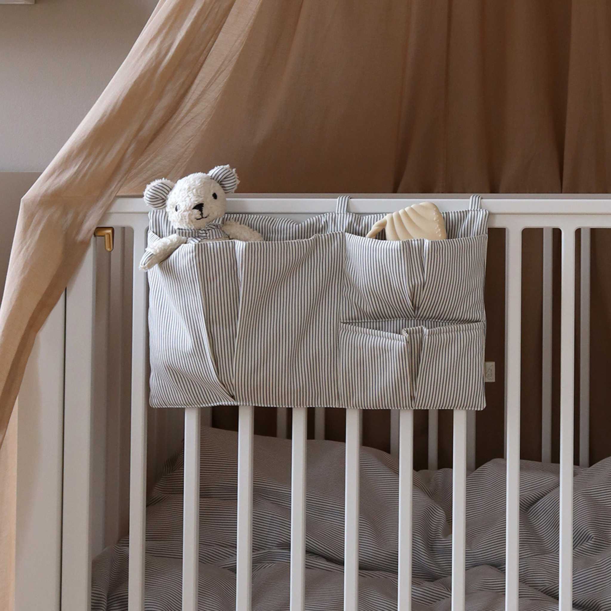 Cam Cam Copenhagen Bed Pocket in Classic Blue Stripes Filled With Teddy and Teether