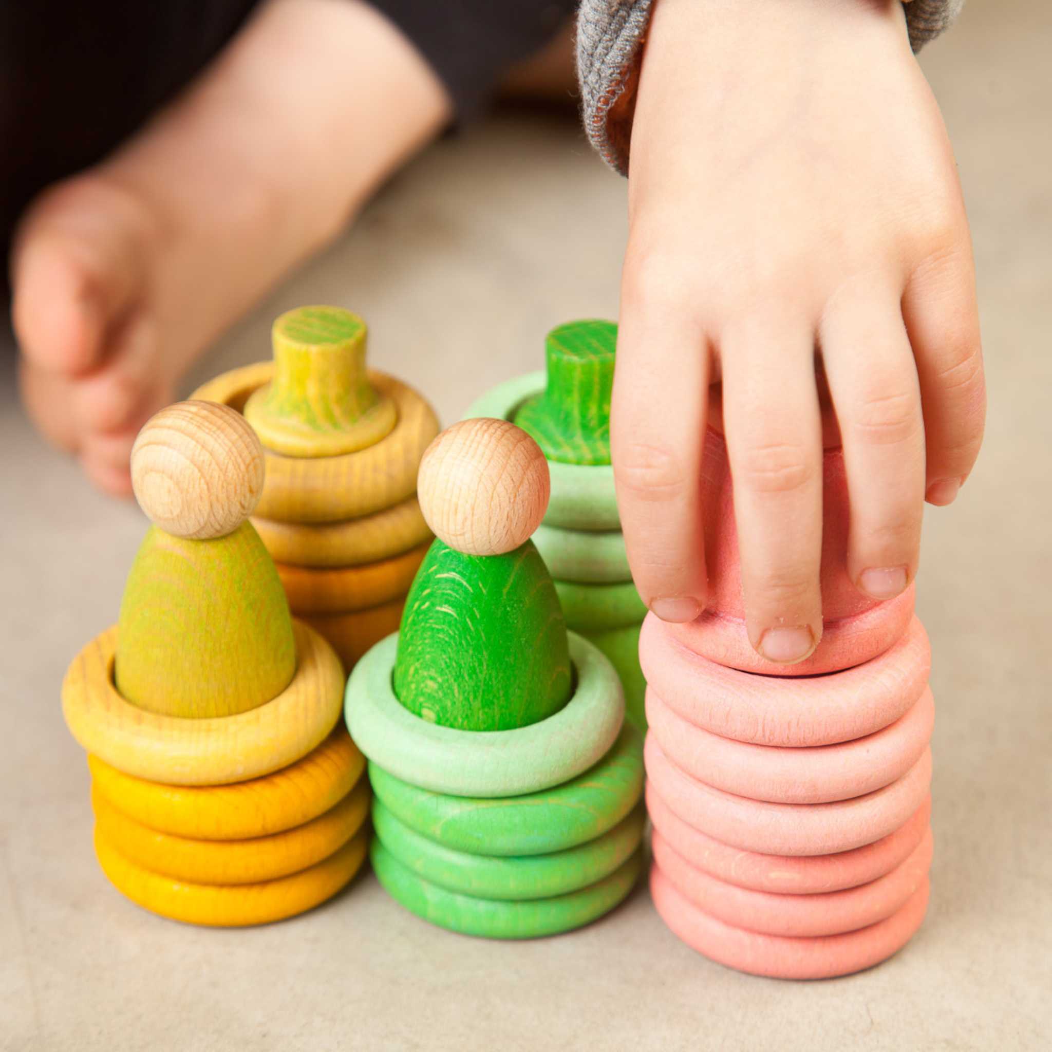 Little Hands Playing With Aguamarina Spring Nins Wooden Play Set