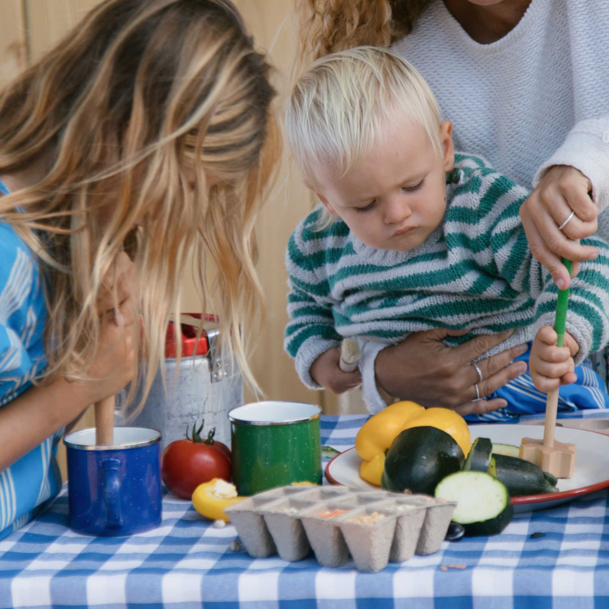 Children Playing With Grapat Tools And Food 