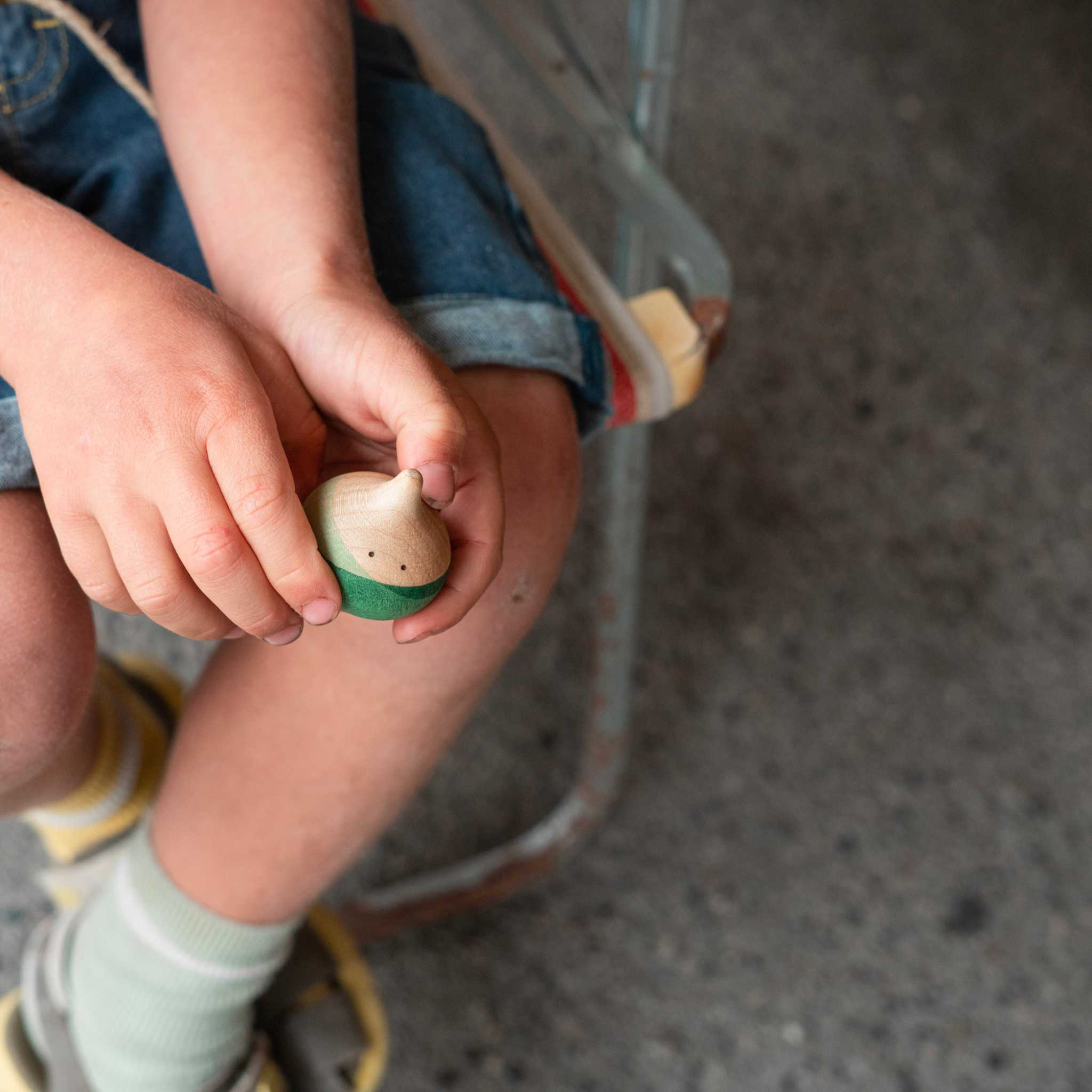 Close Up Of Grapat Lucky Lucky Peg Doll In Boys Hand