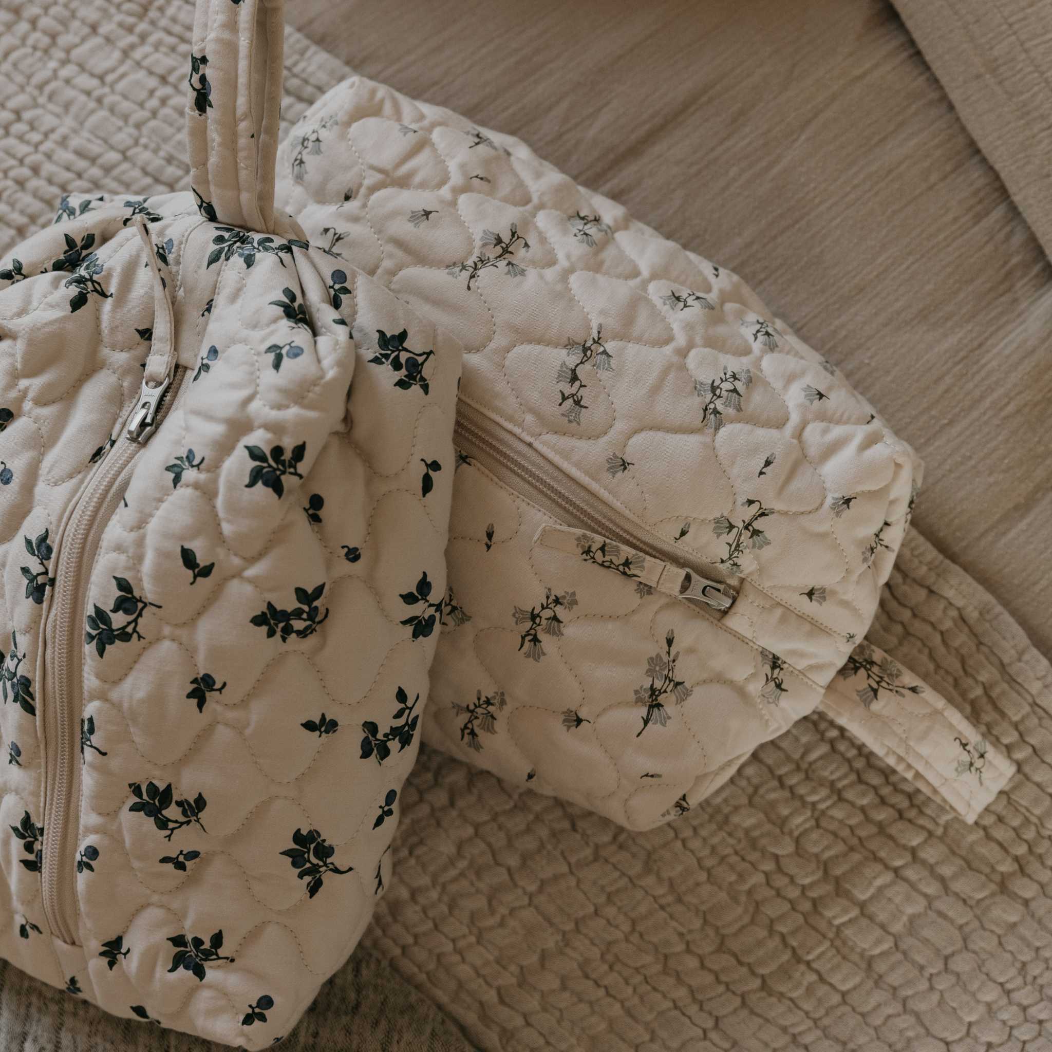 Garbo & Friends Satin Quilted Toiletry Bag - Bluebell - Styled Image