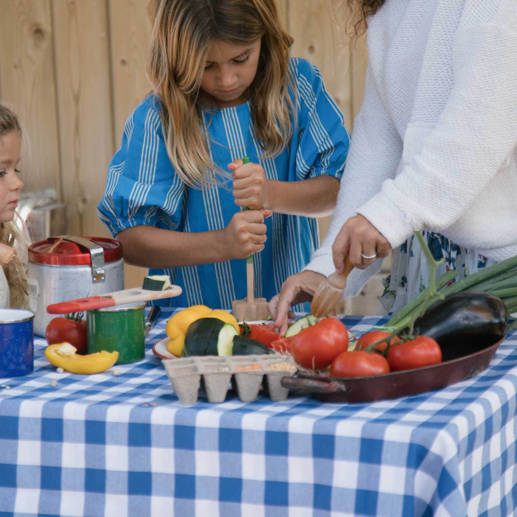 Girl Playing With Grapat Tools And Food