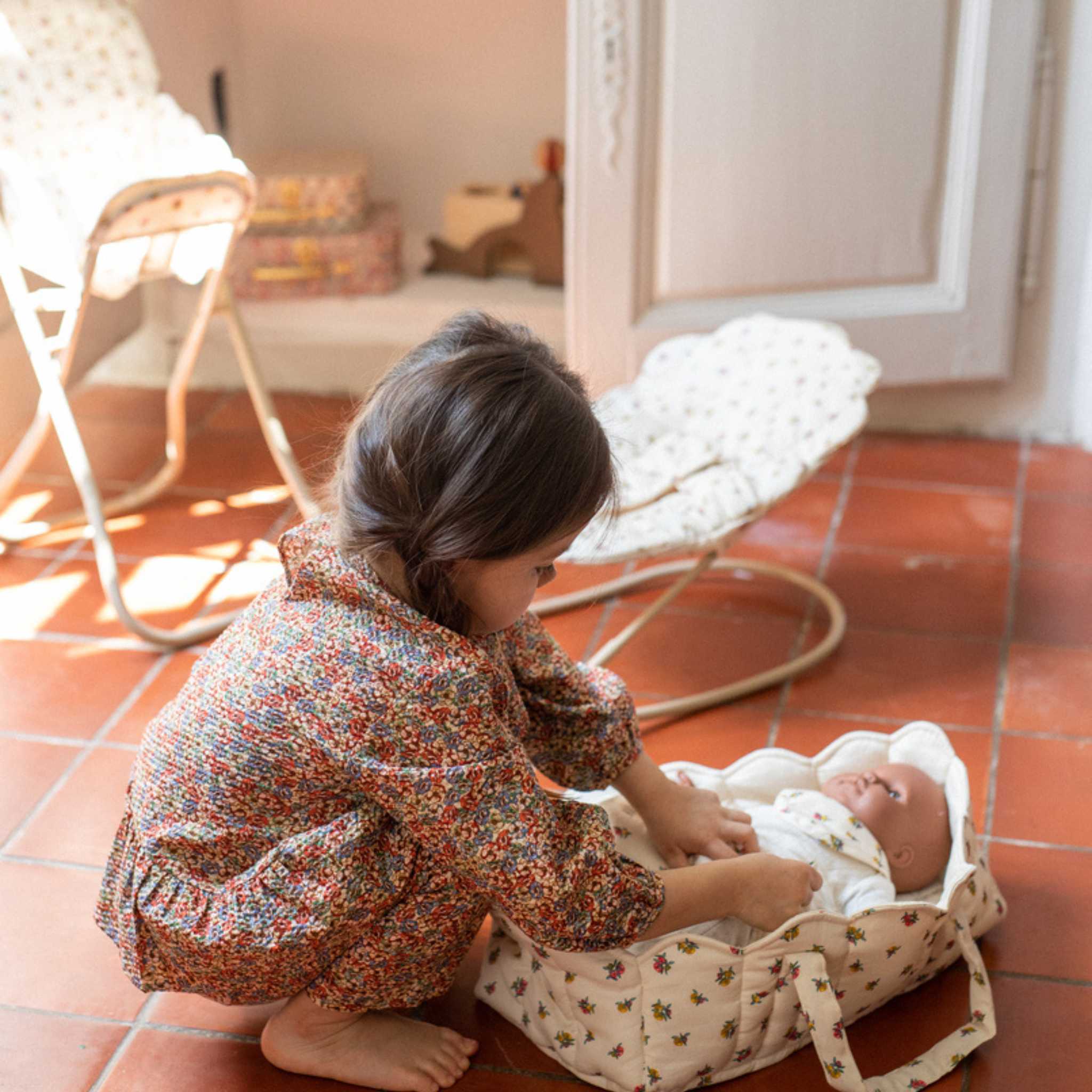 Girl Playing With Konges Slojd Dolls Nursery Set - Peonia 