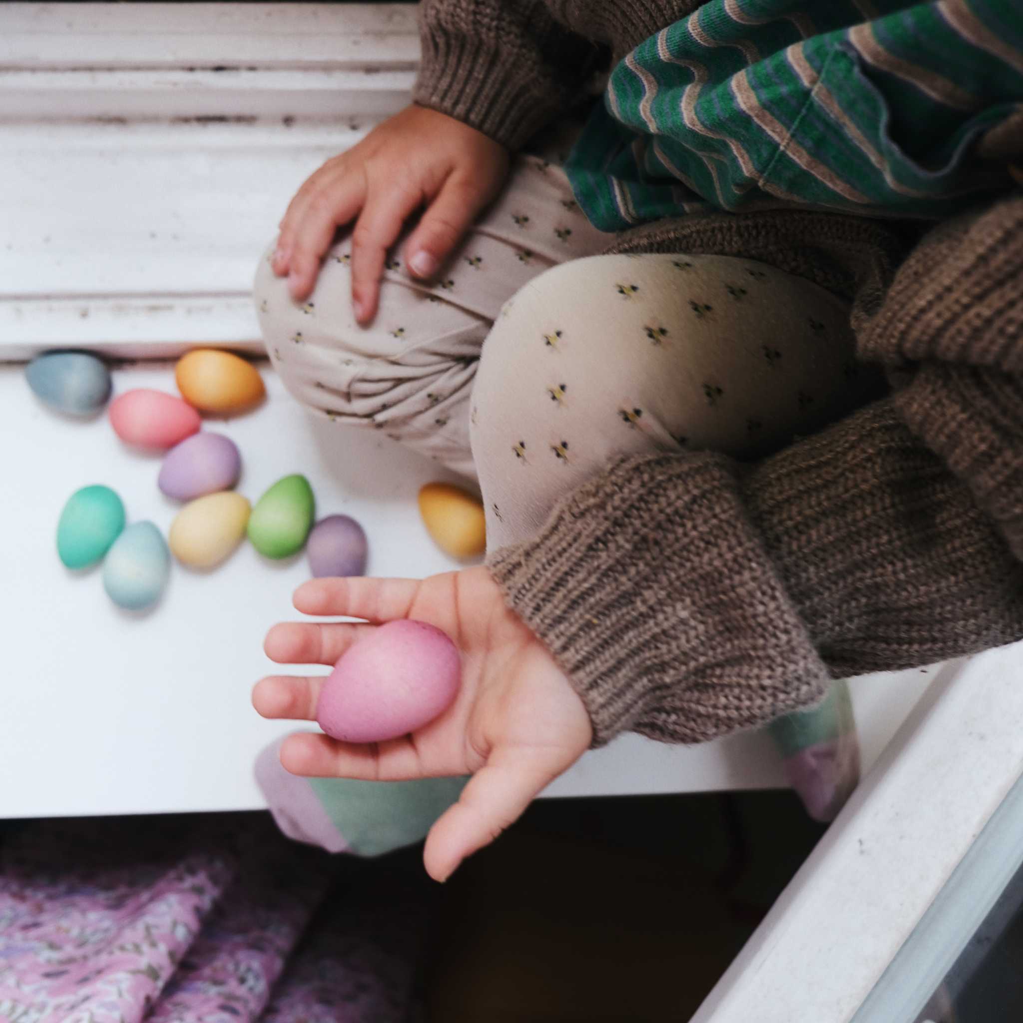 Grapat-Happy-Eggs-Pink-In-Childs-Hand