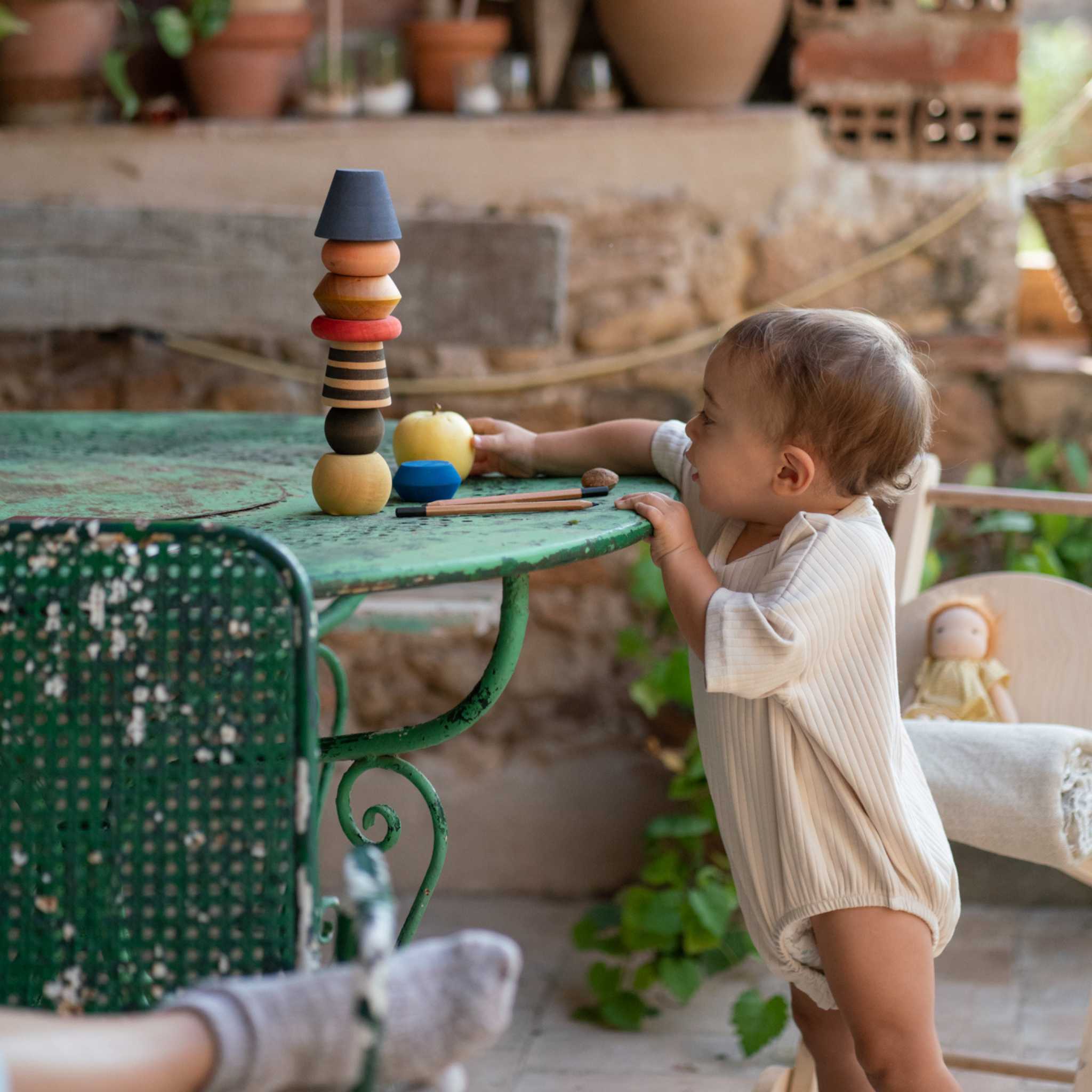 Little One Playing With Grapat Serendipity