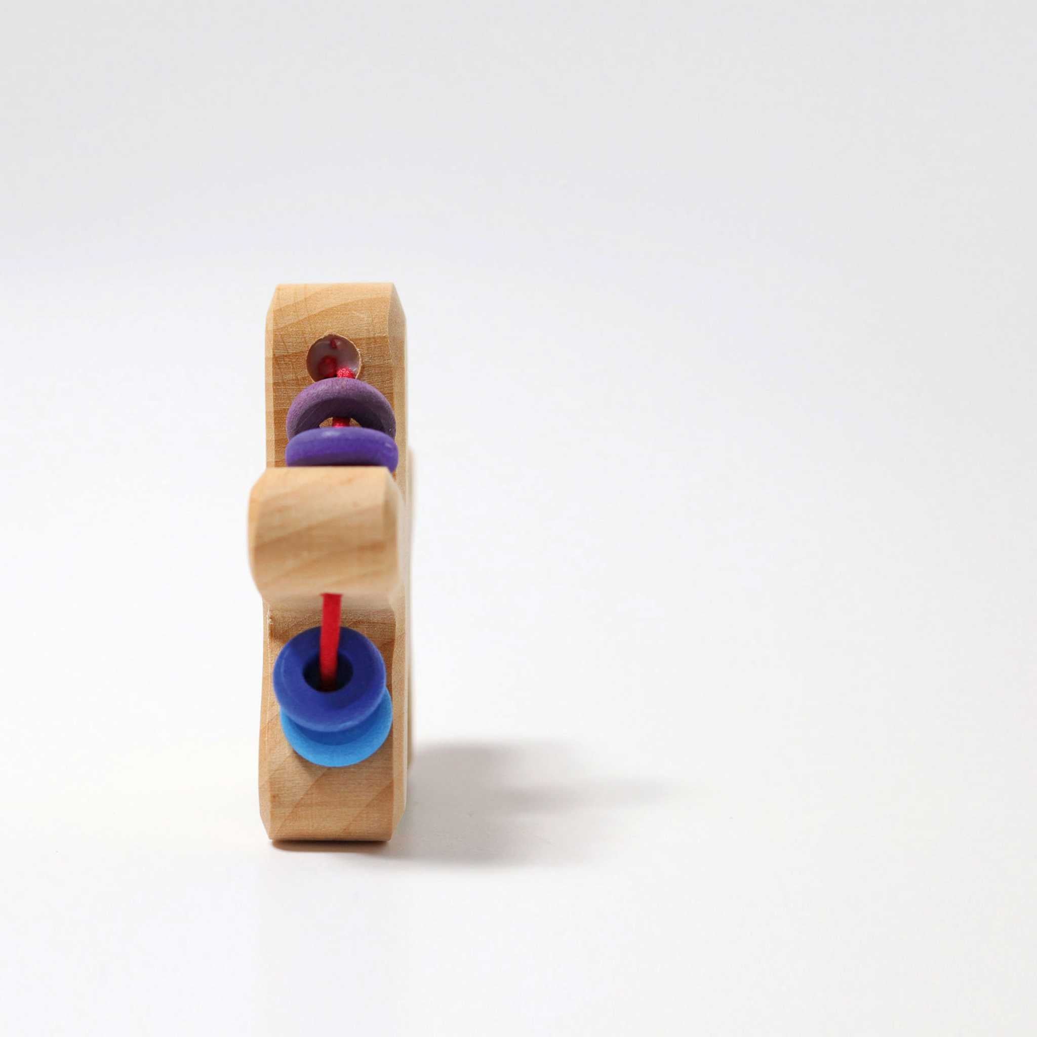 Grimm's Rainbow Star Rattle Side View