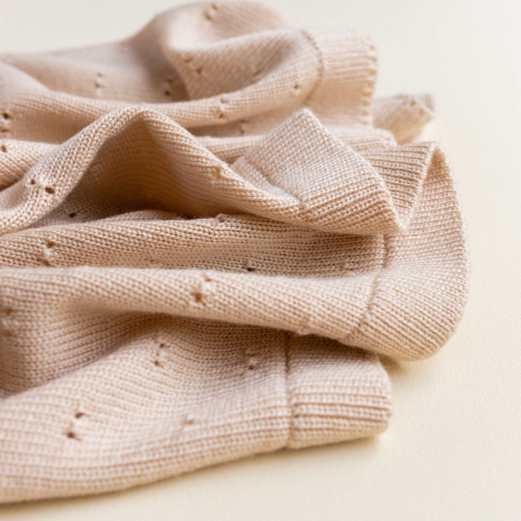 Hvid Merino Wool Bibi Blanket In Oat Softly Folded