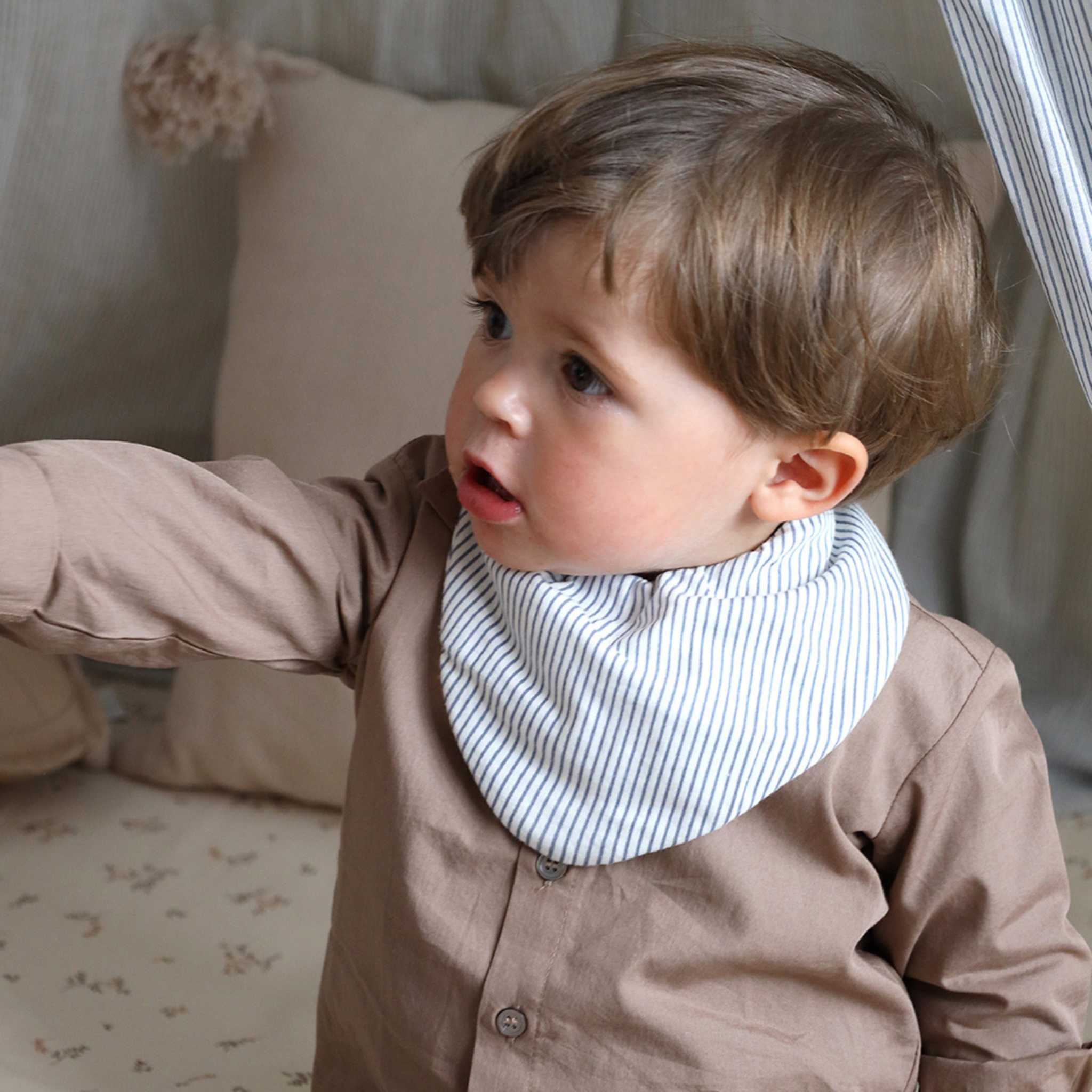 Boy Wearing Cam Cam Jersey Bandana Bib - 2 Pack - Classic Blue Stripes