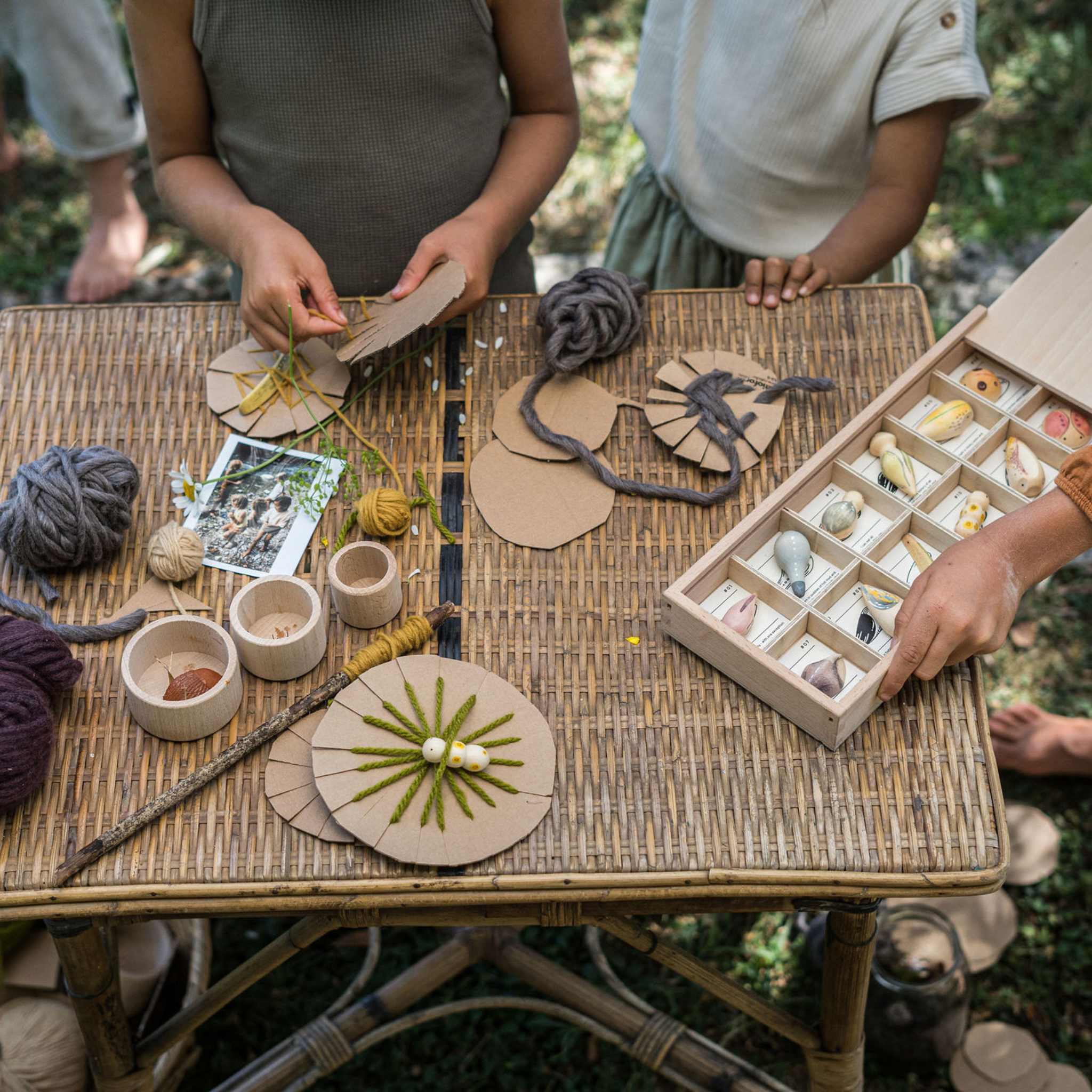 Children Playing at Table With Grapat Wild Wooden Set
