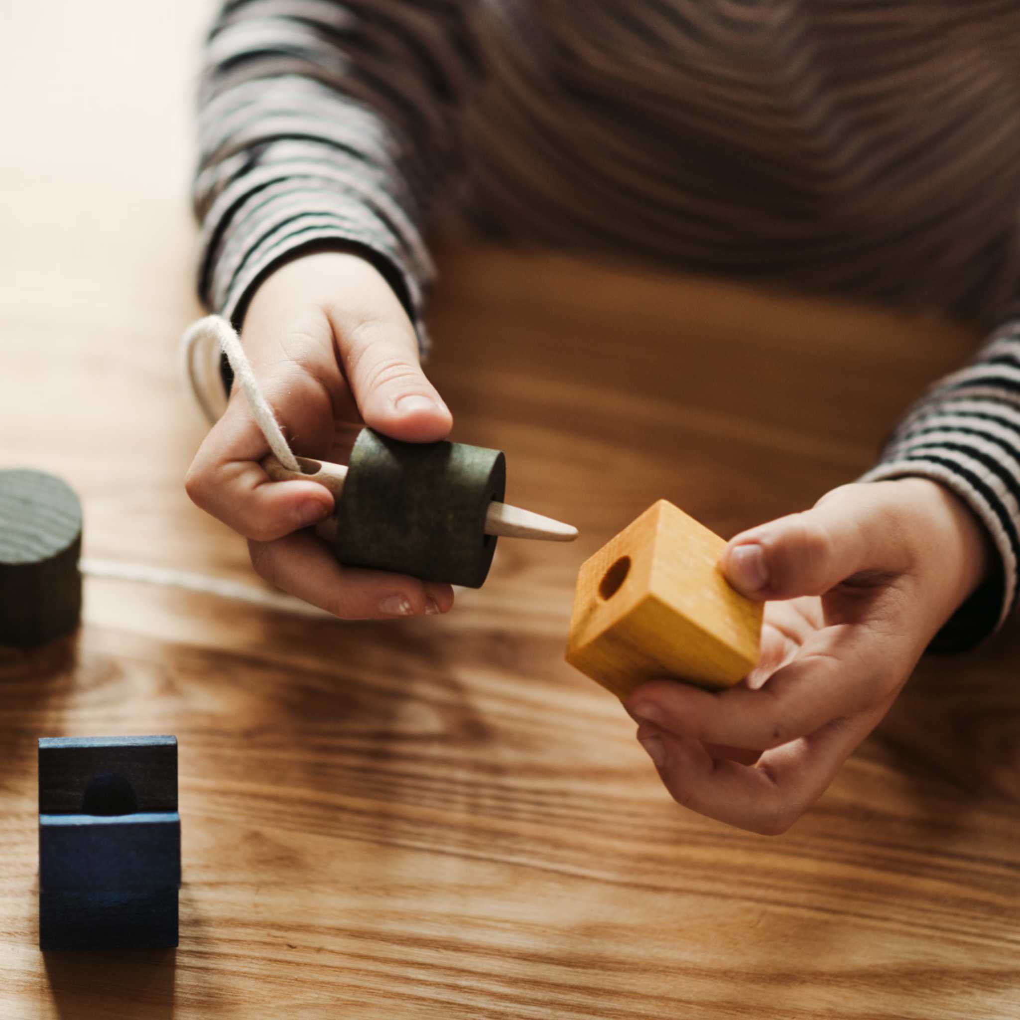 Little Hands, Wooden Pieces and Wooden Needle