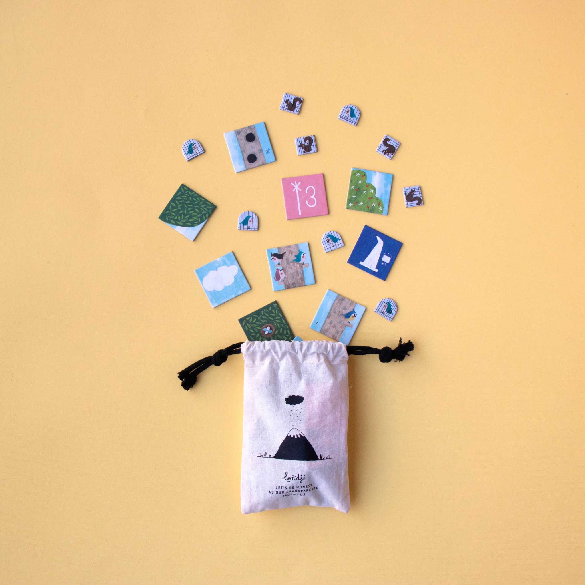 Londji The Fairy And The Wizard Game Pieces Coming Out Of Bag