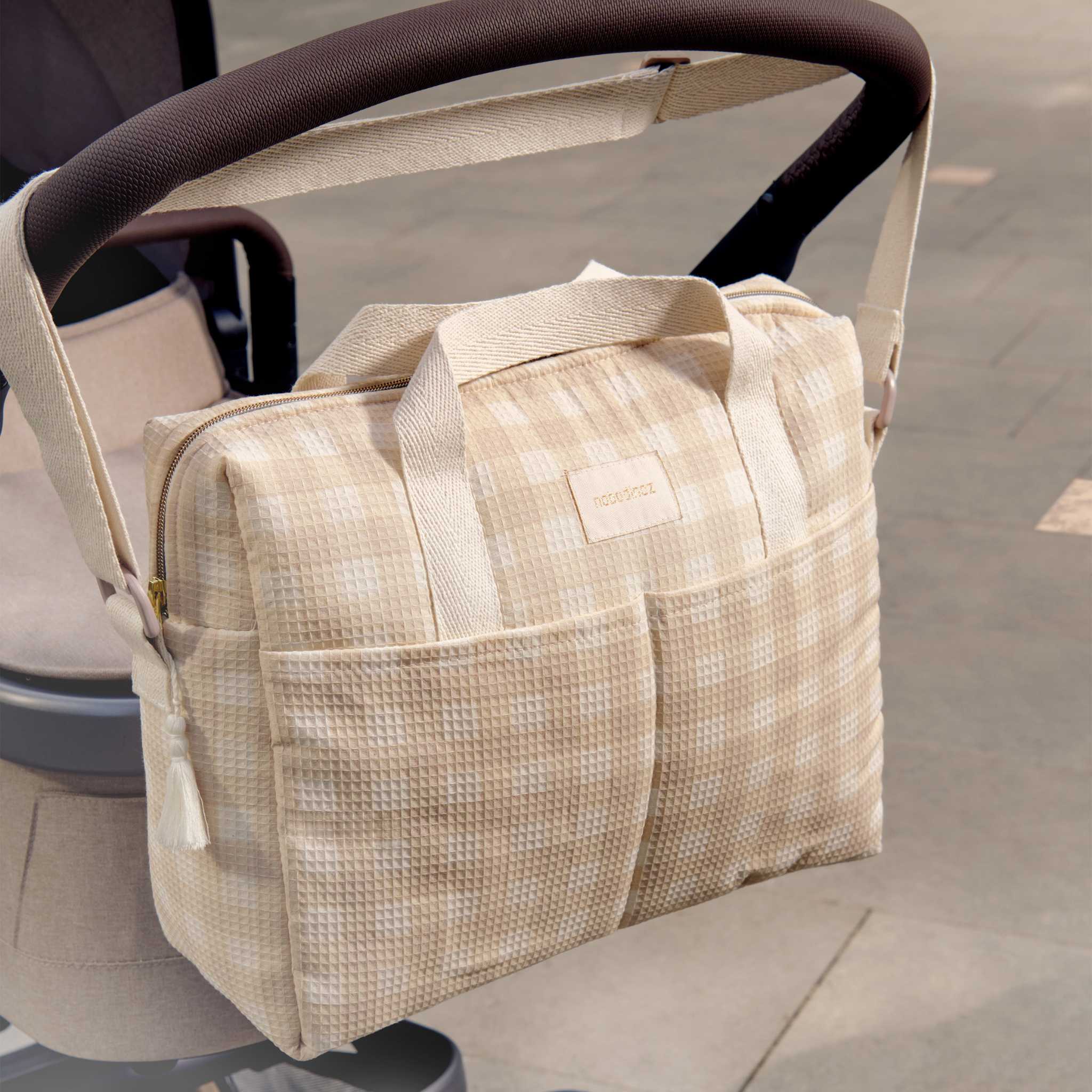Nobodinoz Gala Changing Bag - Ivory Checks - Hanging On Pram