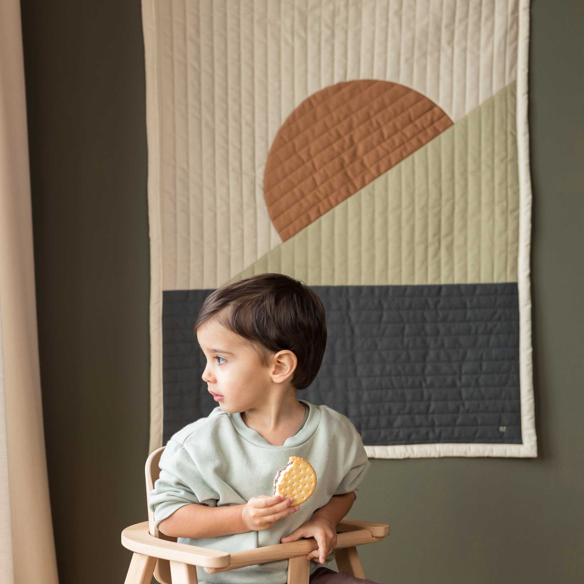 Nododinoz Landscape Quilted Blanket Behind Boy In Highchair