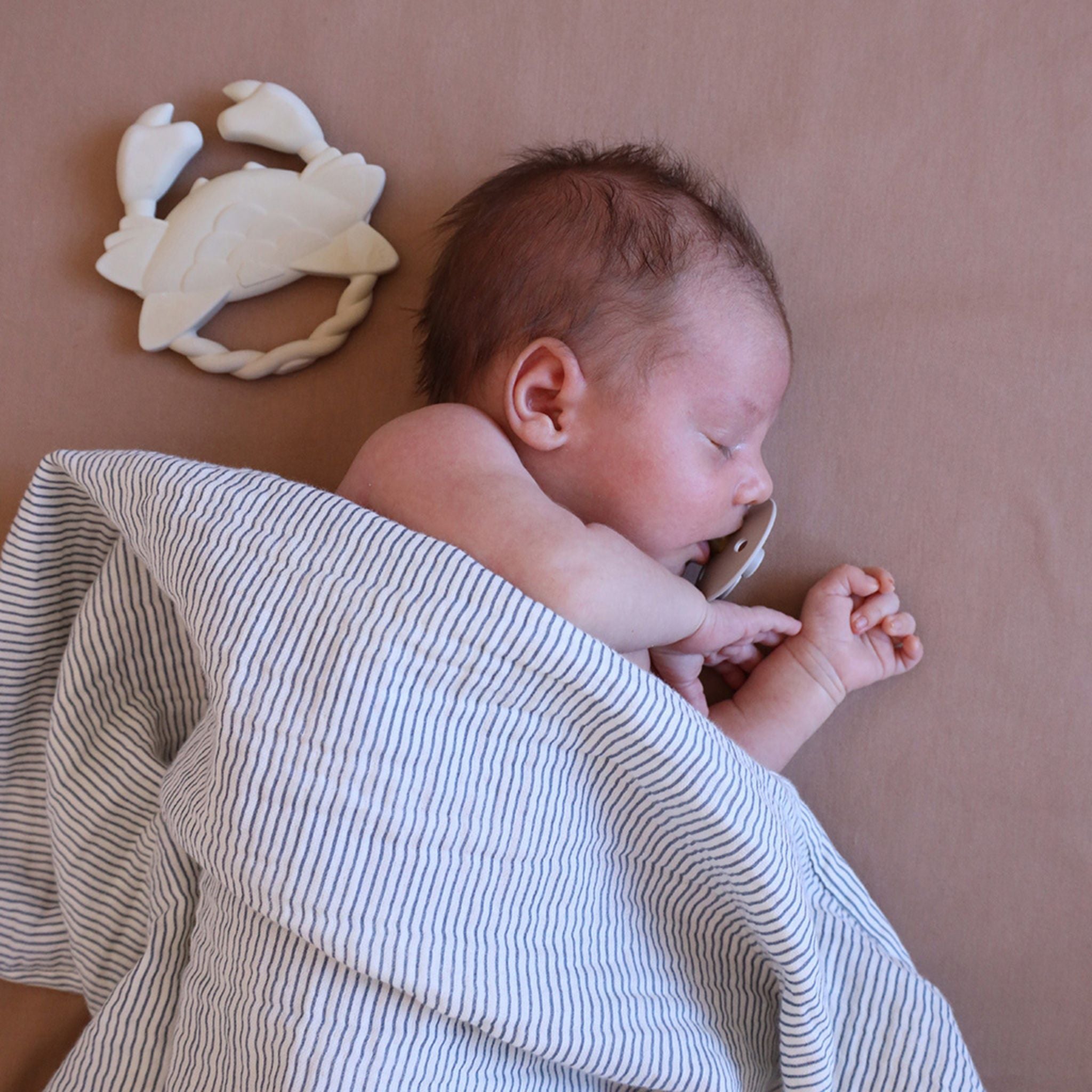 Sleeping Baby In Cam Cam Copenhagen Muslin Baby Blanket - Blue Stripes