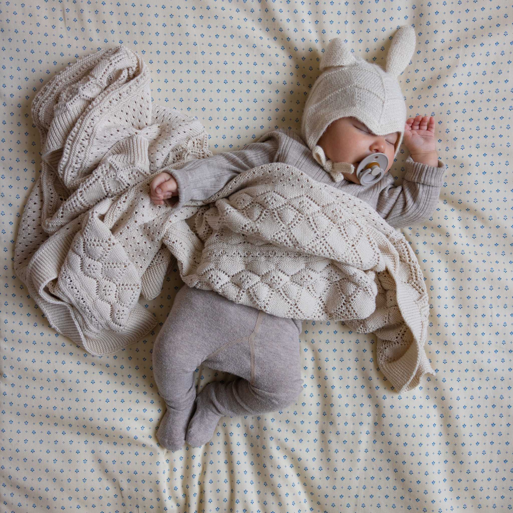 Sleeping Baby in Cam Cam Pointelle Blanket - Off White