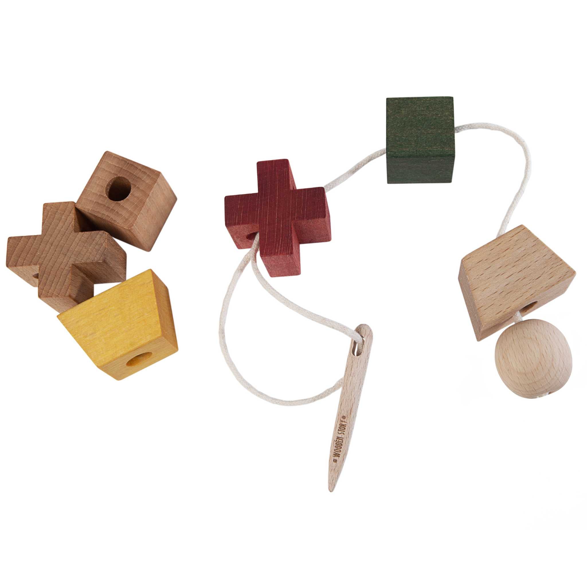 Wooden Story Wooden Needle and Wooden Pieces On White Background