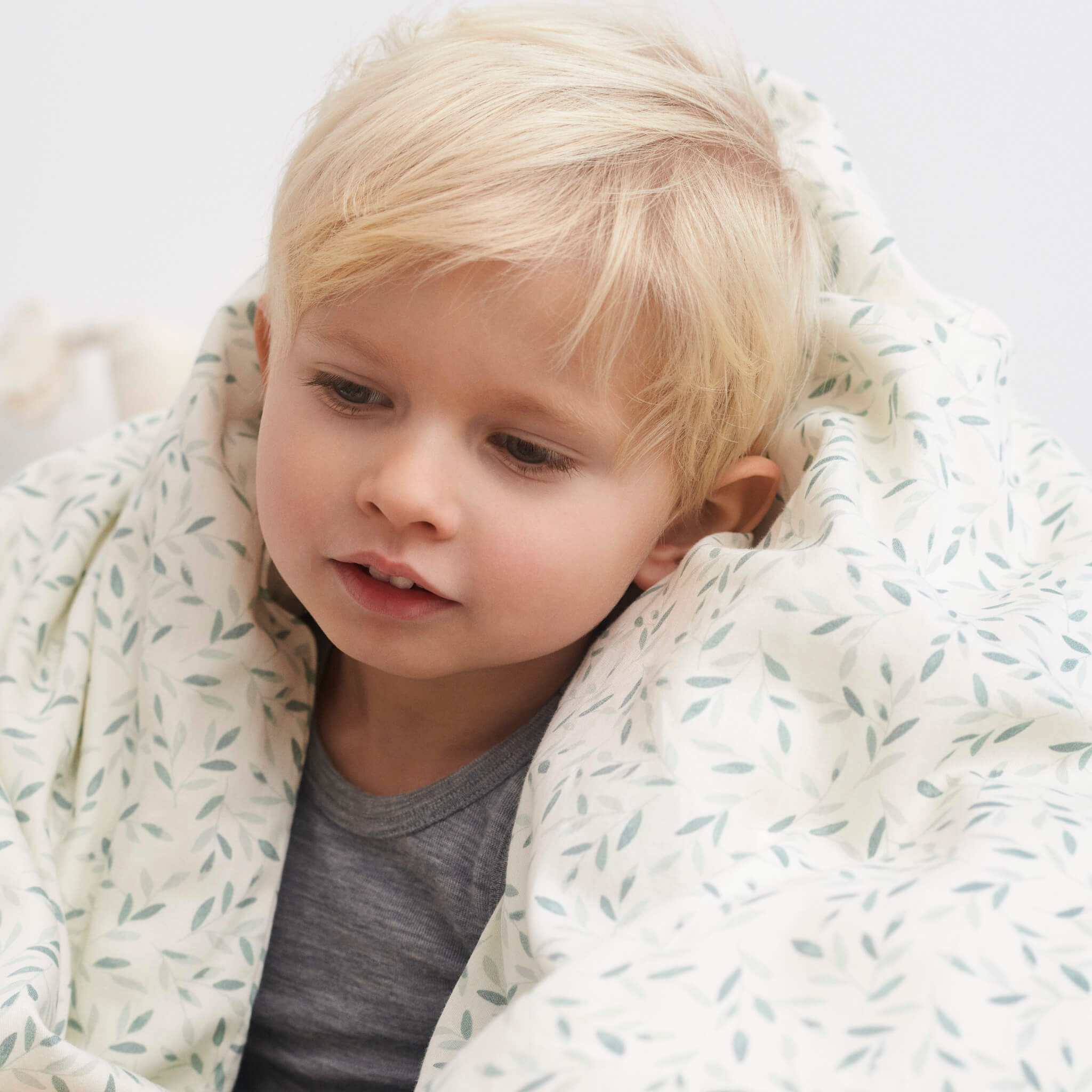 Cam Cam Copenhagen Toddler Bedding Set in Green Leaves Print with Boy