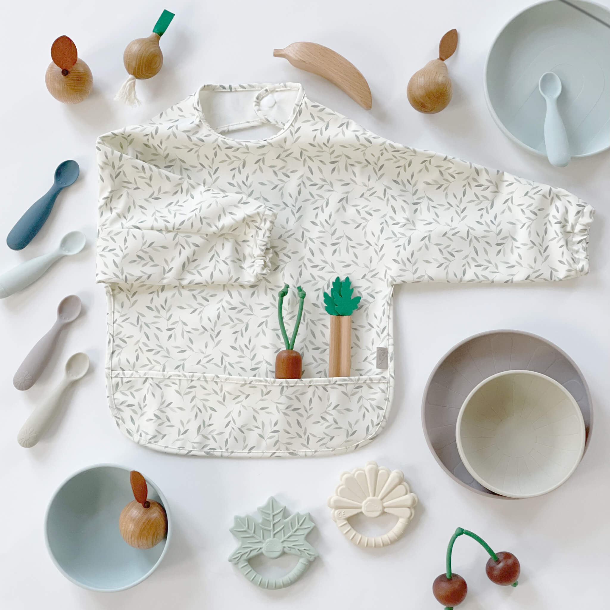 Cam Cam Copenhagen Sleeved Bib in Green Leaves