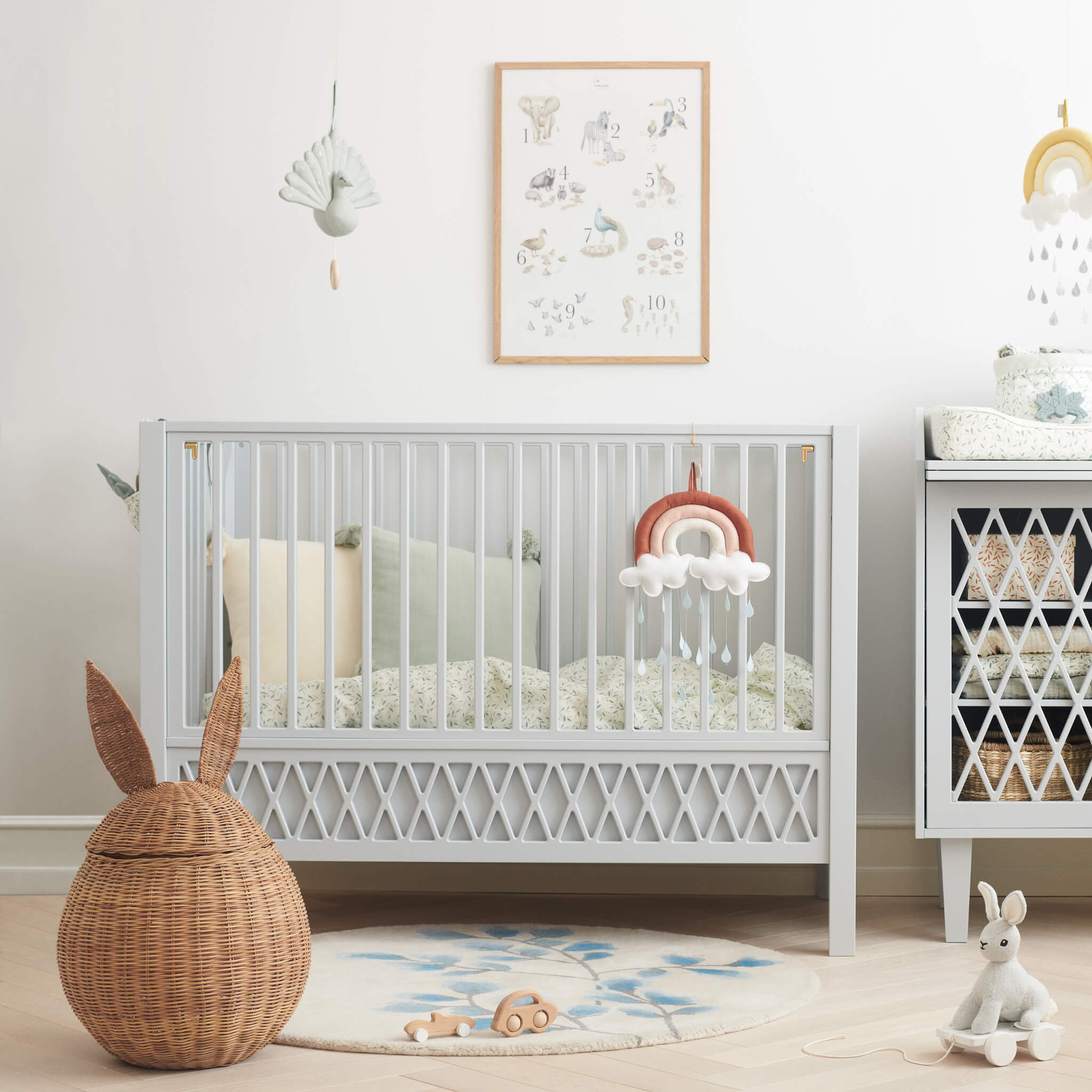 Cam Cam Copenhagen Peacock Musical Mobile in Grey on Nursery