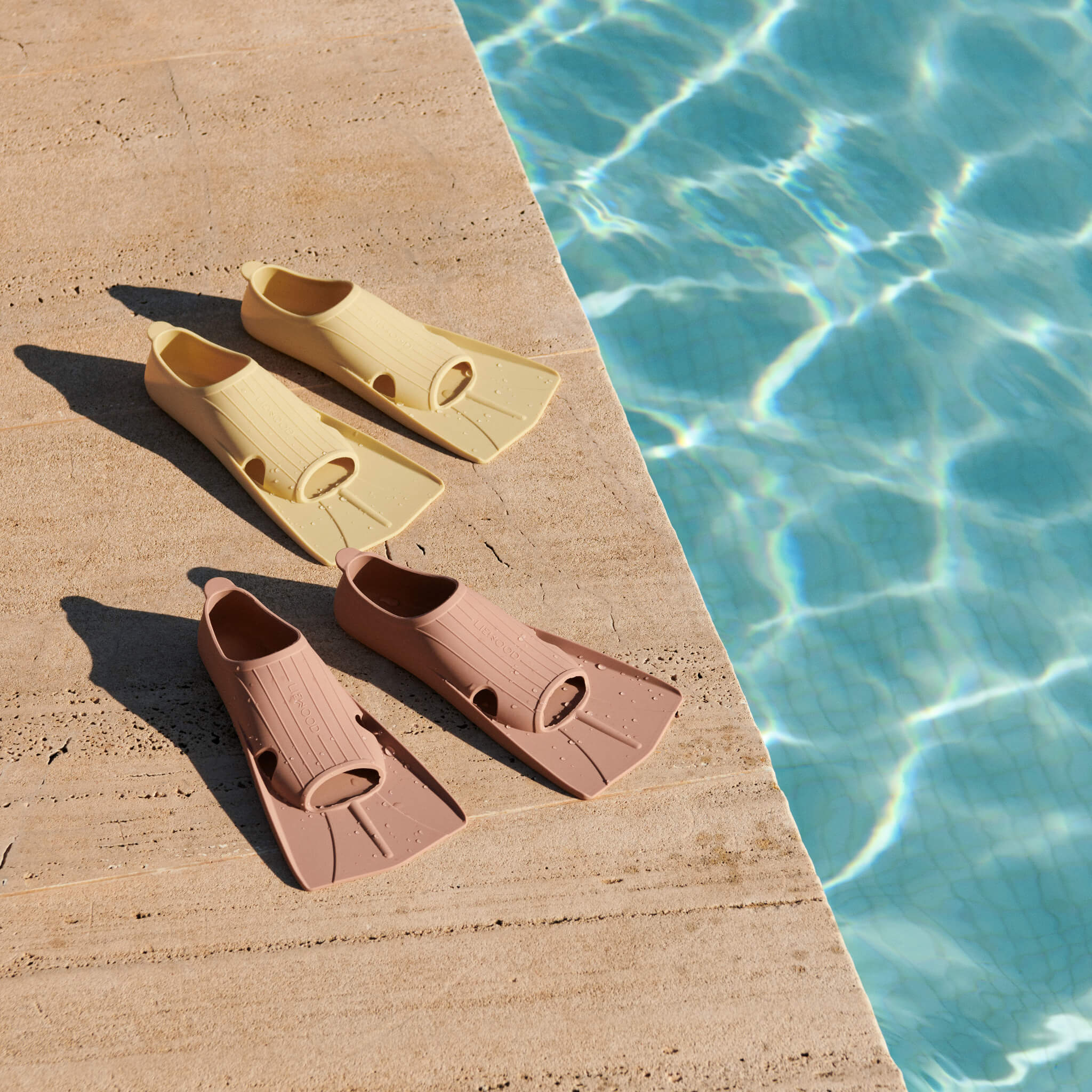 Liewood Gustav Swim Fins in Tuscany Rose by Pool