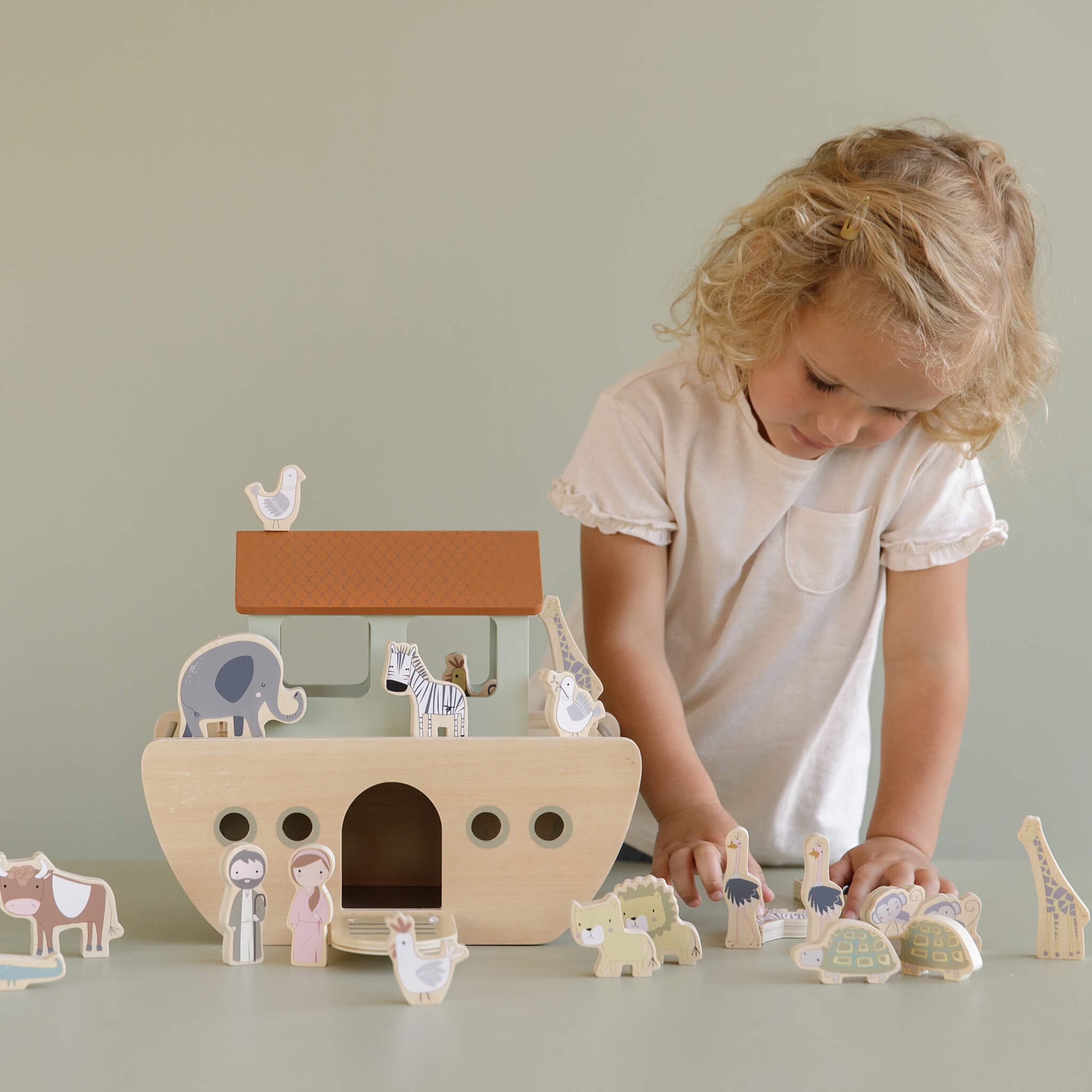 Girl with Wooden Noahs Ark Playset Toy