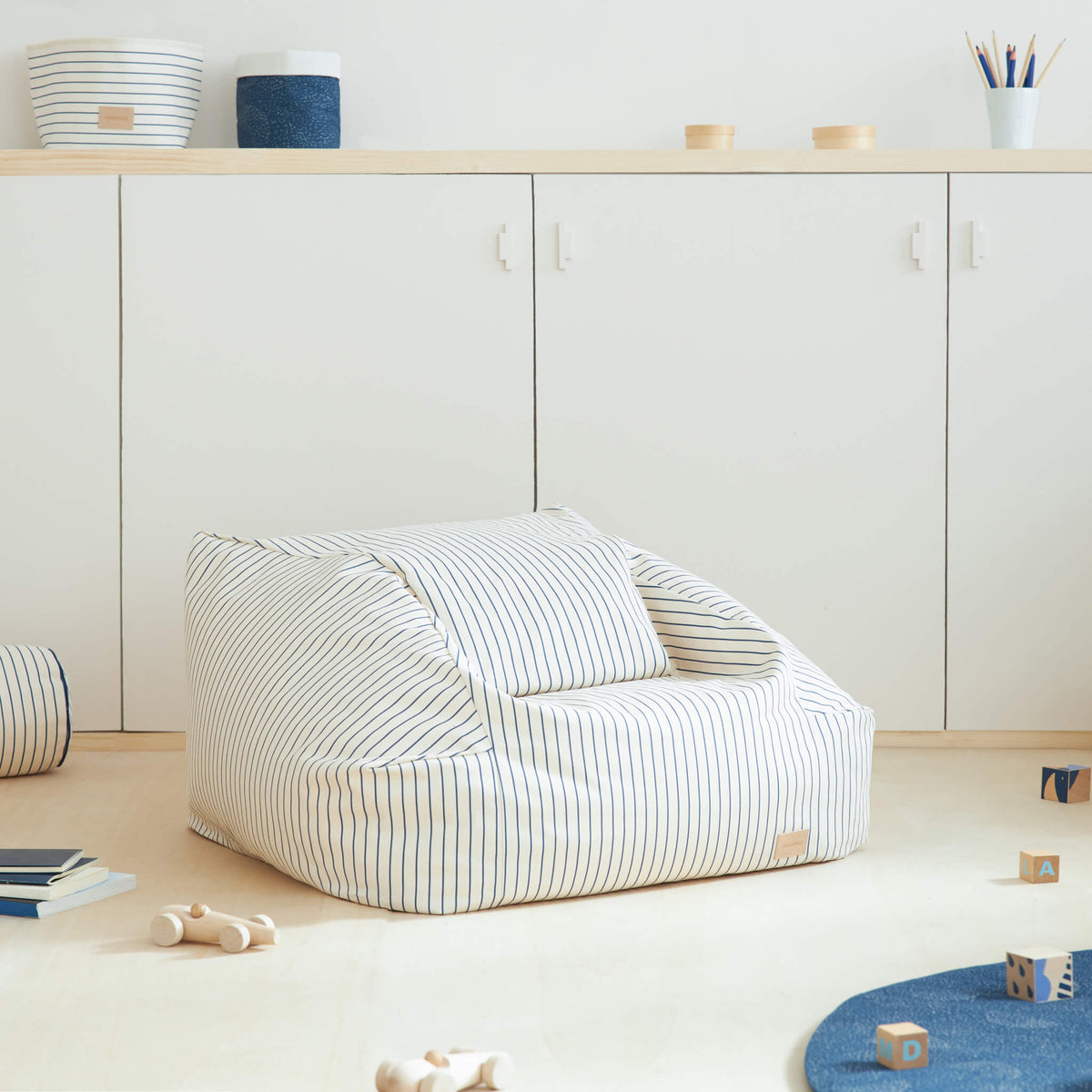 Nobodinoz Chelsea Bean Bag in Blue Stripes in Room