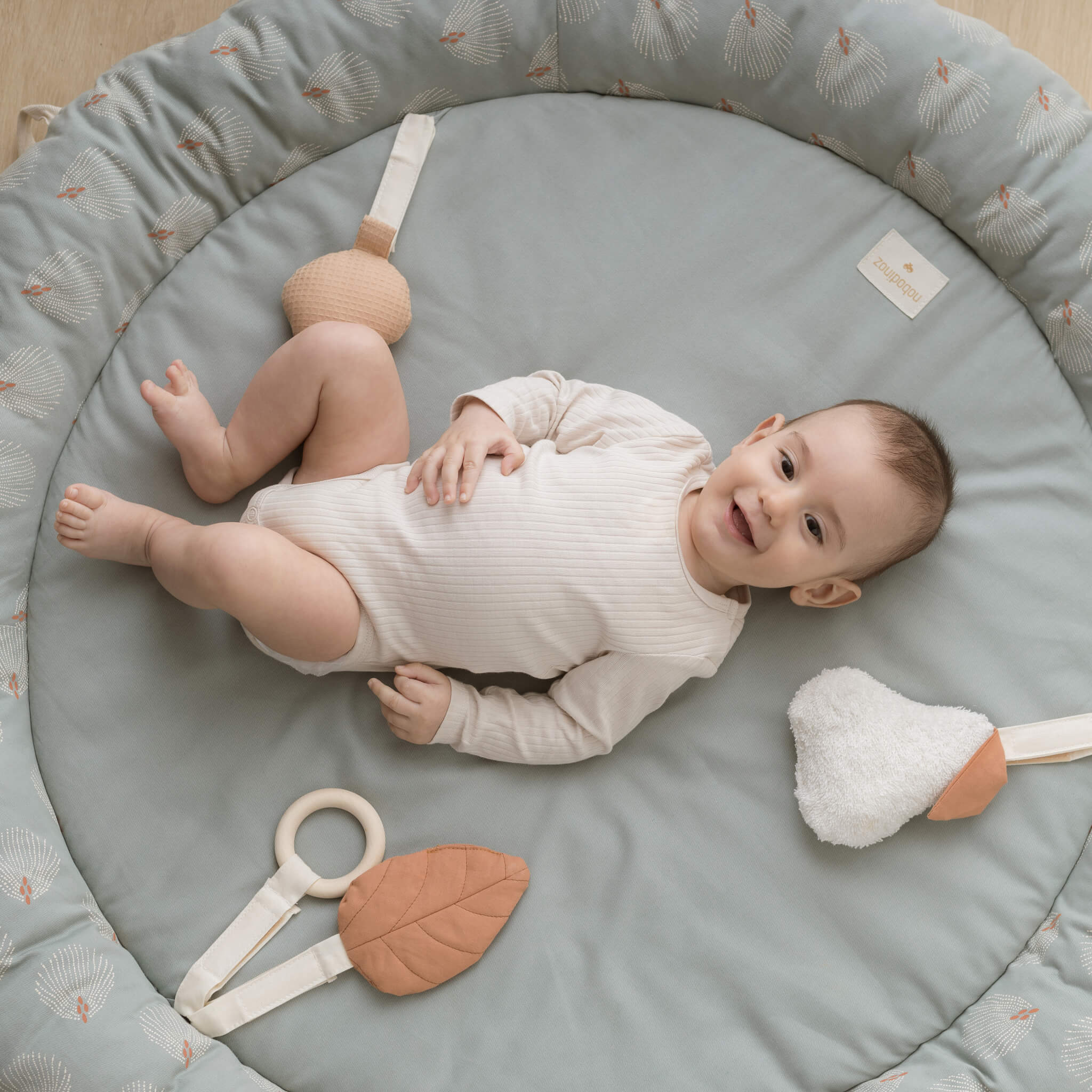 Nobodinoz Growing Green Baby Activity Nest in Forest with Baby