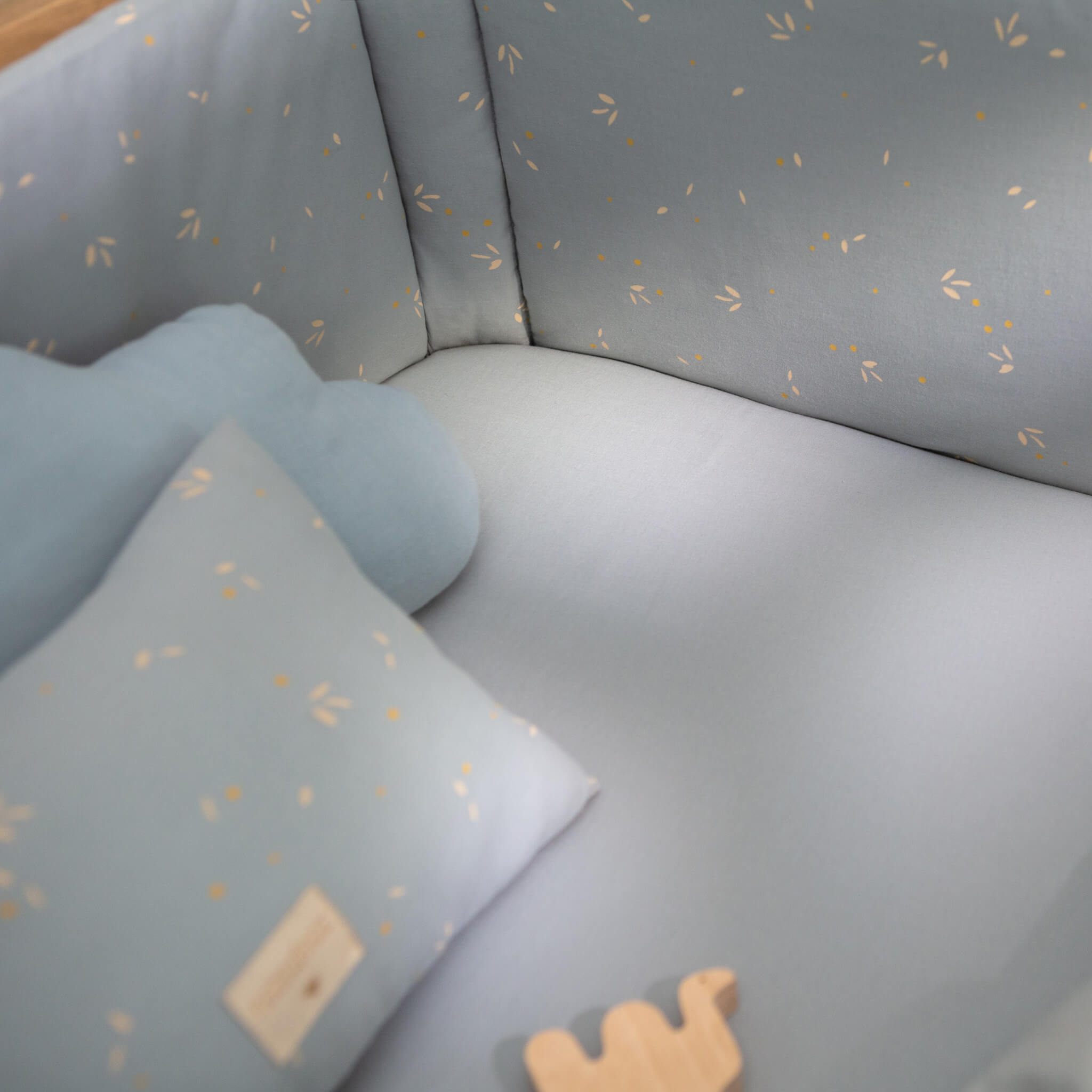 Nobodinoz Tibet Sheet in Soft Blue on Cot