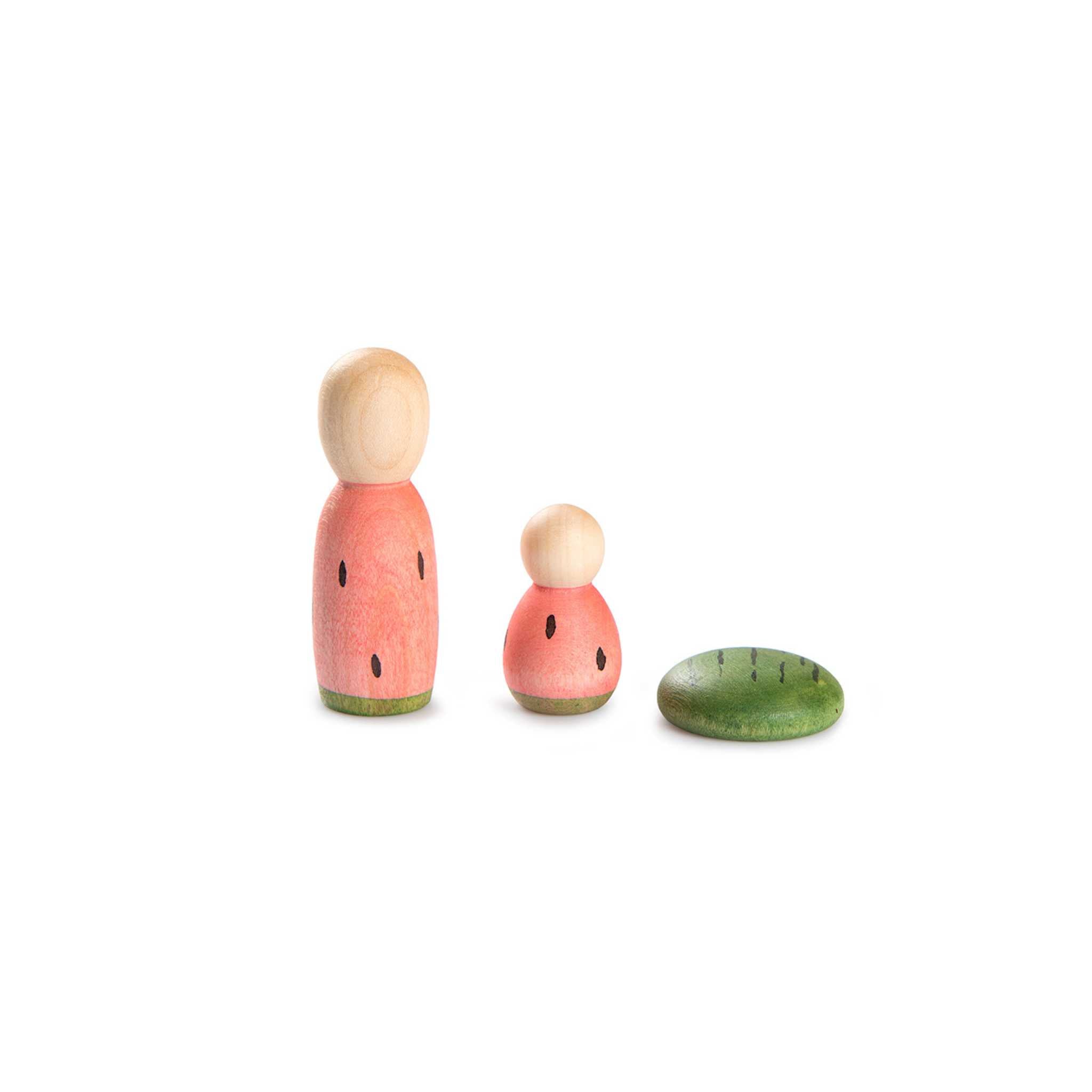 3 Pink and Green Wooden Toys From Grapat Lucky Lucky Collection on White Background