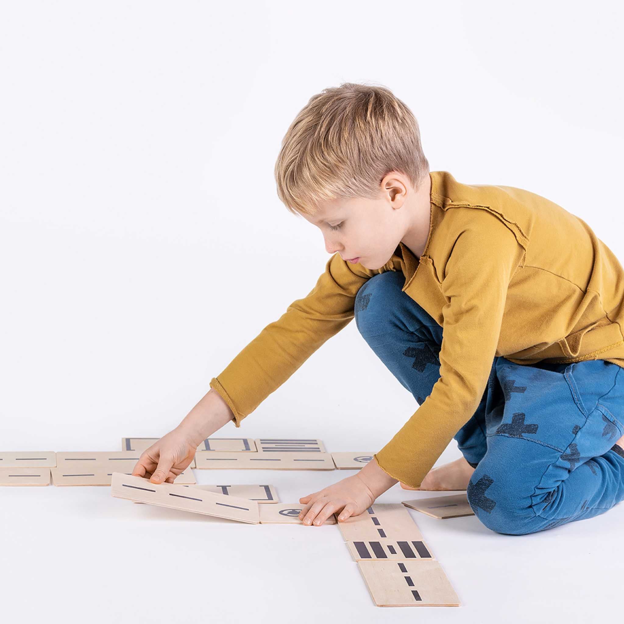 Boy Playing With Just Blocks Just Roads Set