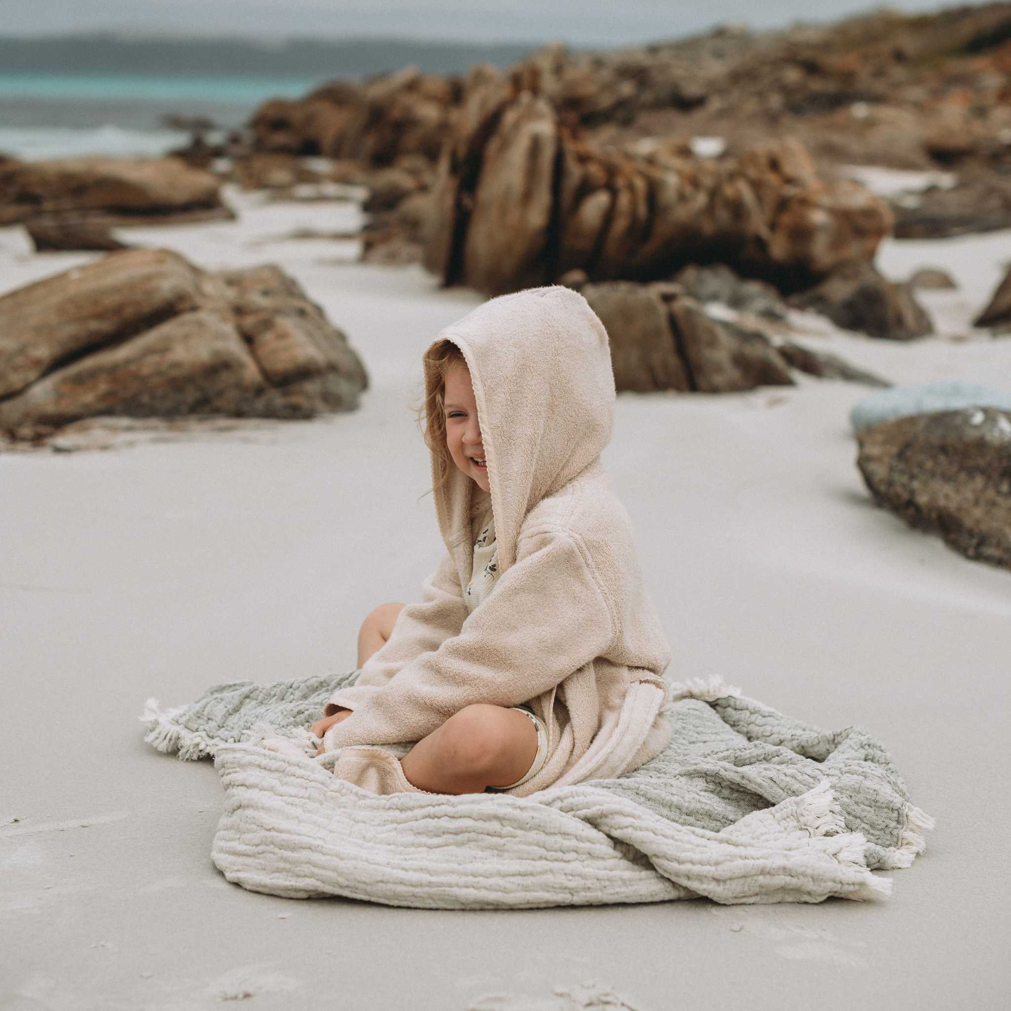 Child On Blanket On Beach In Garbo & Friends Bathrobe - Sand