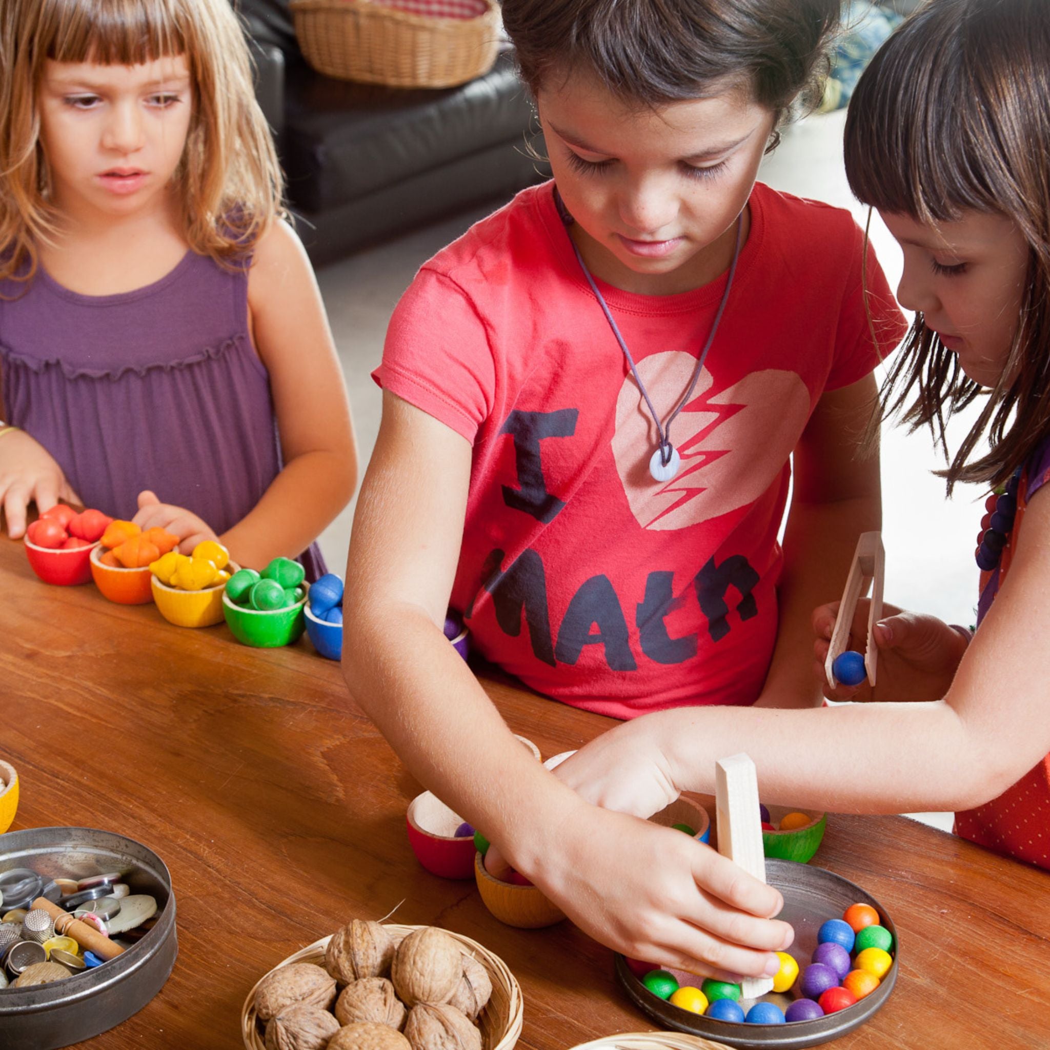 Children Playing With Grapat Wooden Bowls and Acorns Set