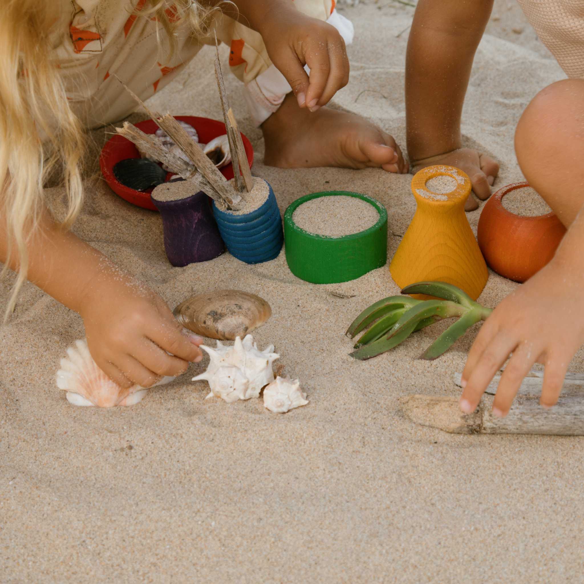 Chidden Playing With Grapat Pots 