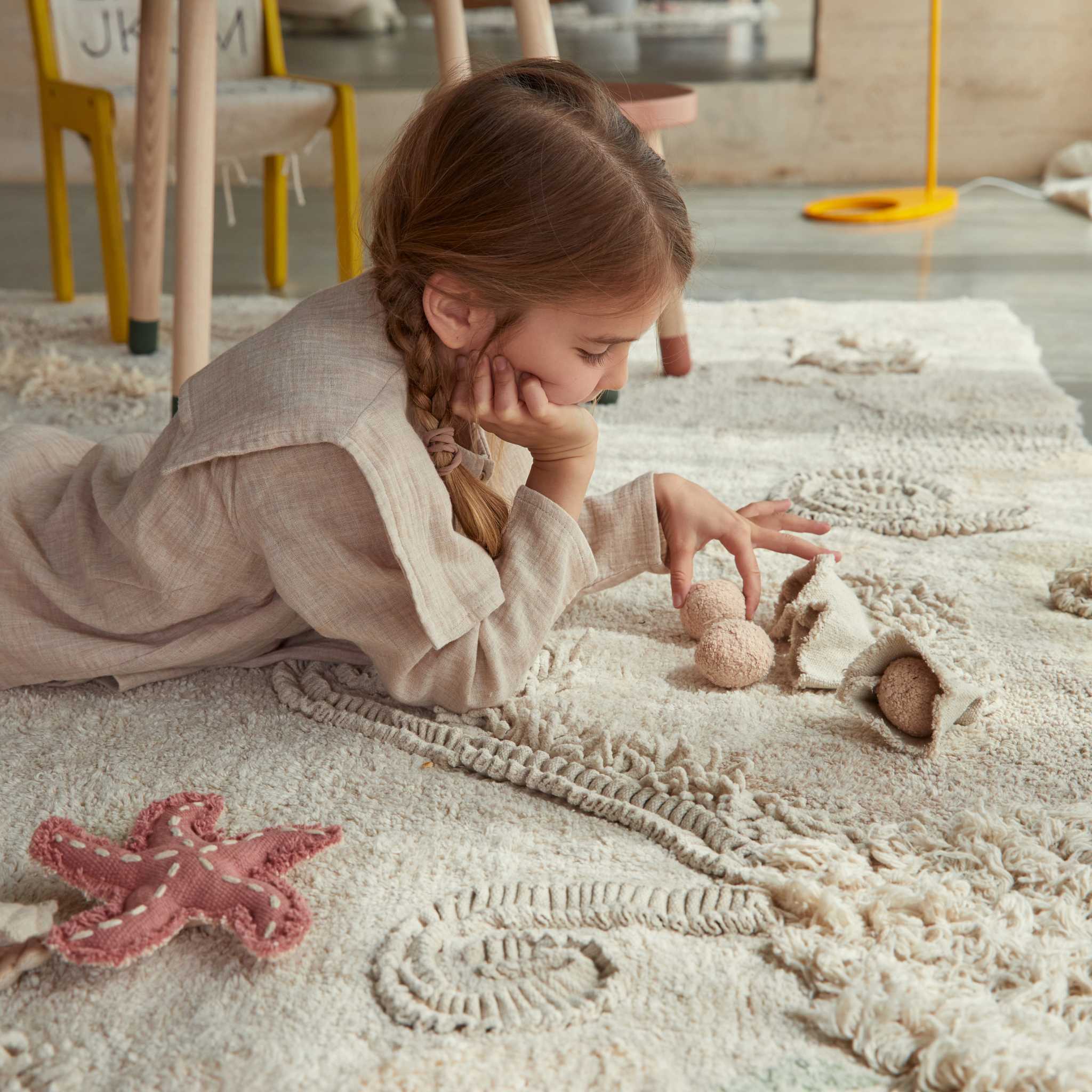 Girl Playing With Lorena Canals Washable Play Rug Seabed