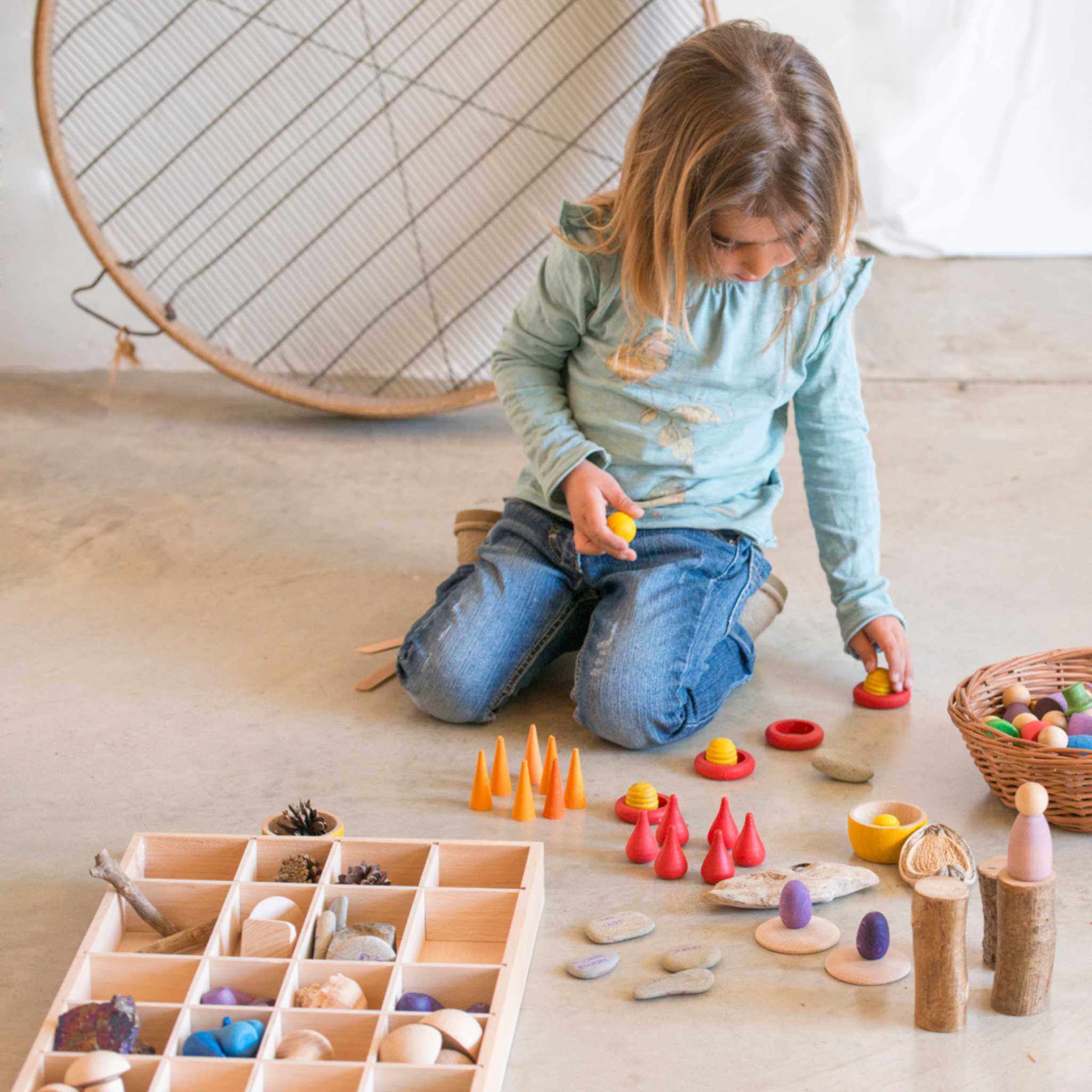 Girl Playing With Grapat Tinker Tray