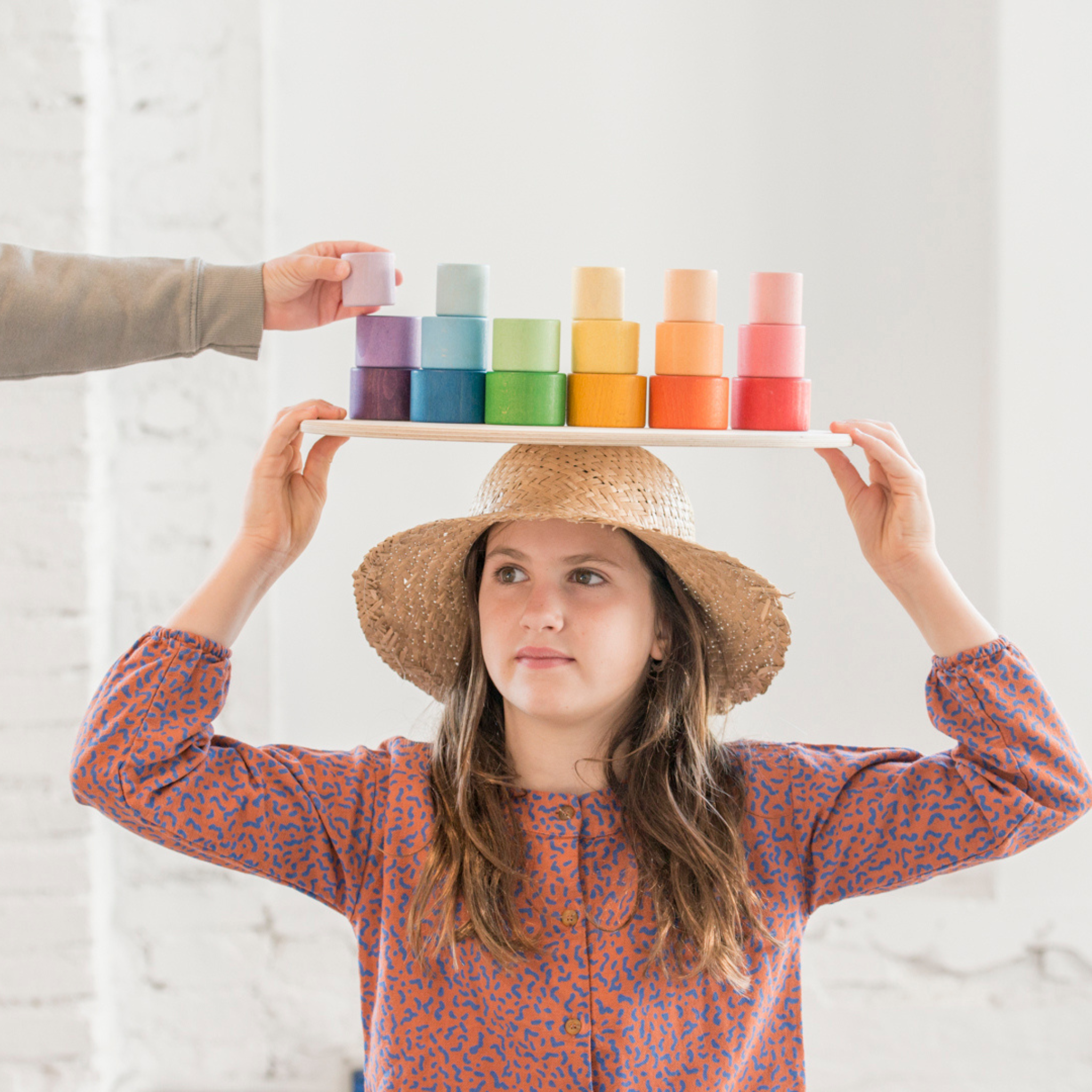 Girl With Grapat Nesting Bowls