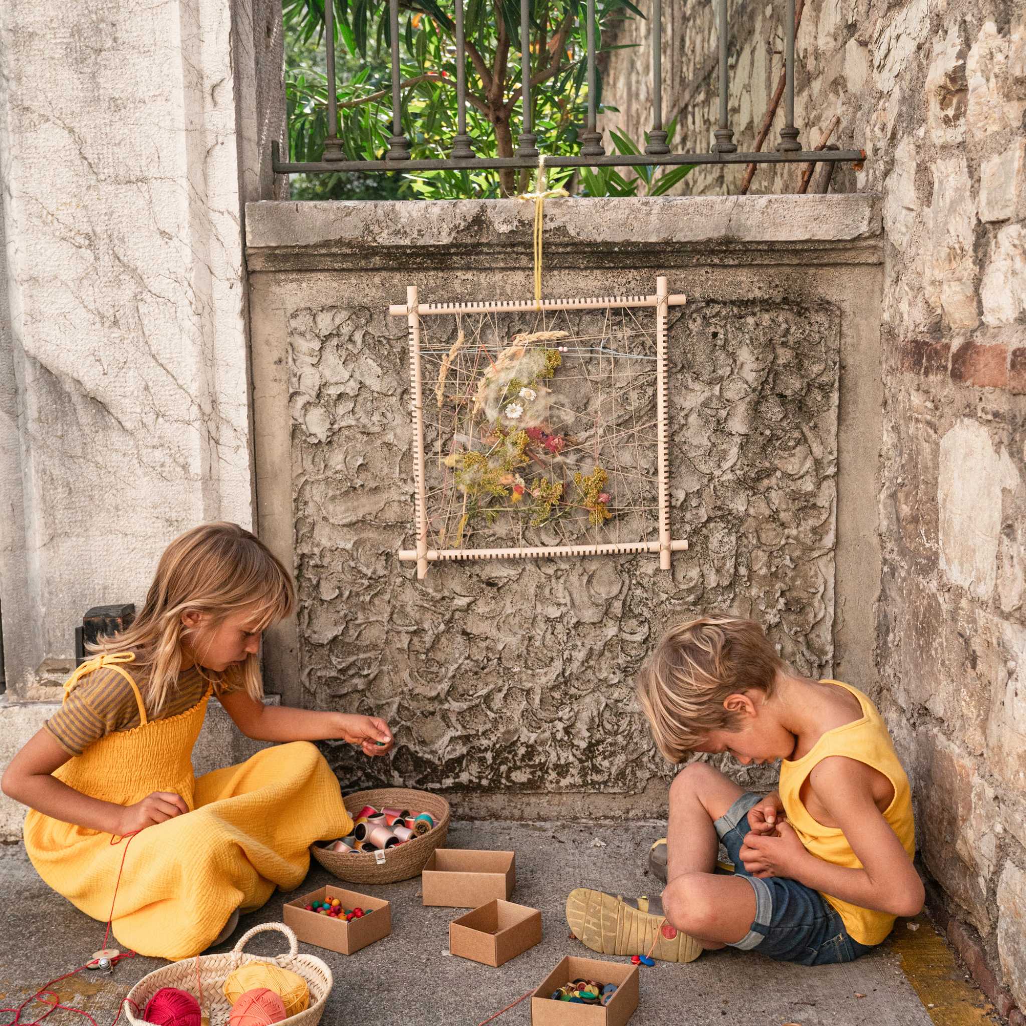 Children Playing With Grapat Weaving Frame