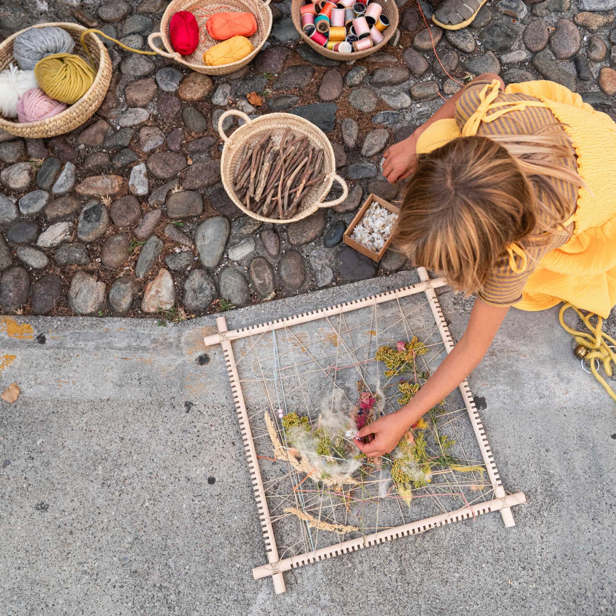 Children Playing With Grapat Weaving Frame