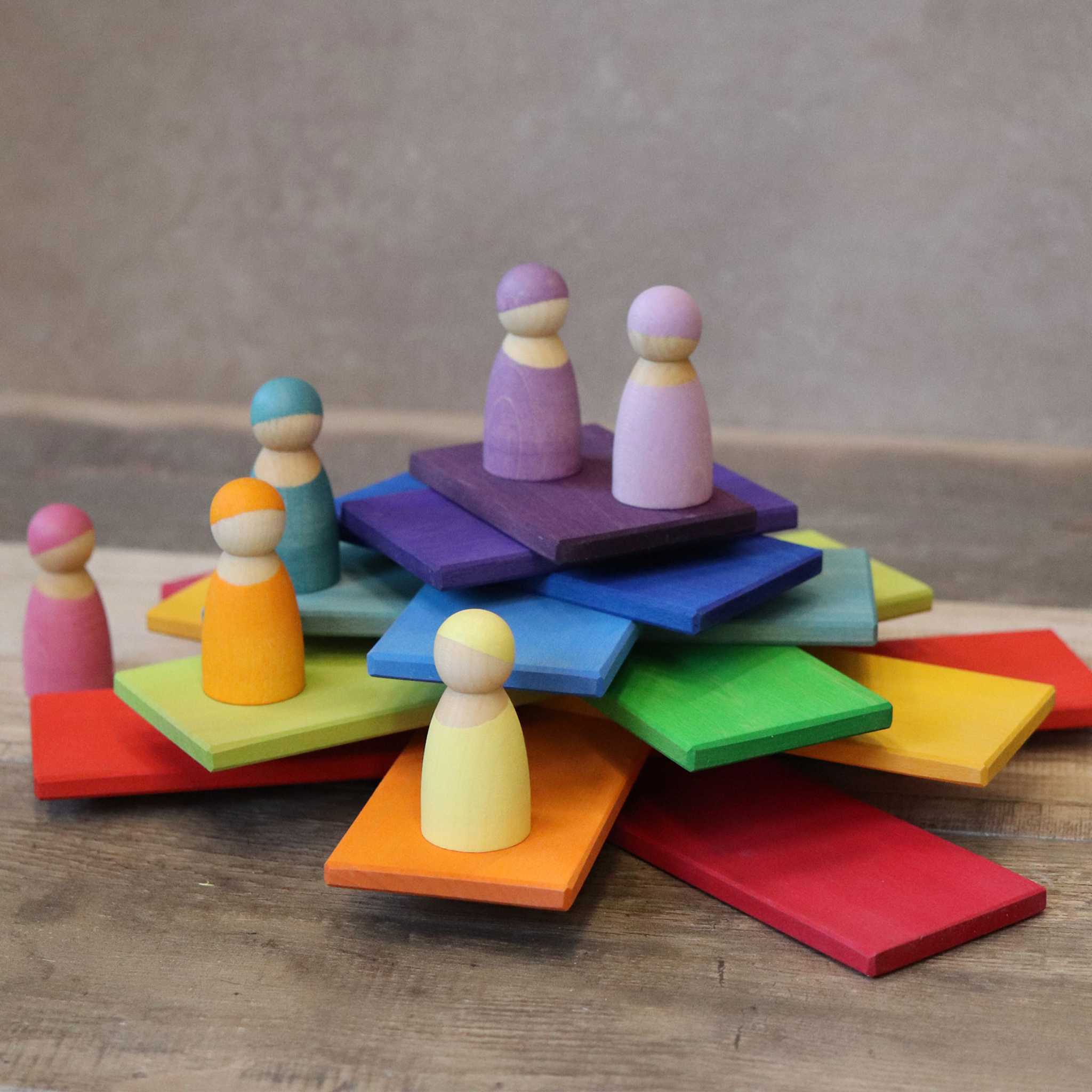 Grimm's Rainbow Building Boards - Stacked With People