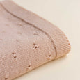 Hvid Merino Wool Bibi Blanket In Apricot Folded Close Up