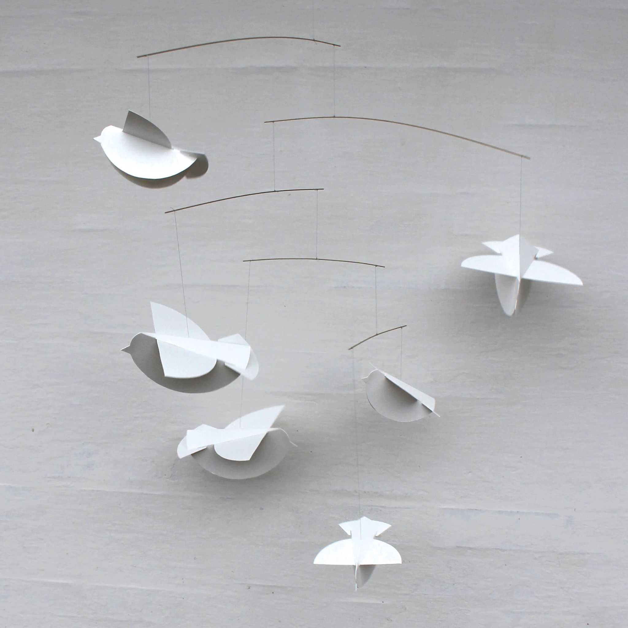 Livingly Bird Paper Mobile On Grey Background