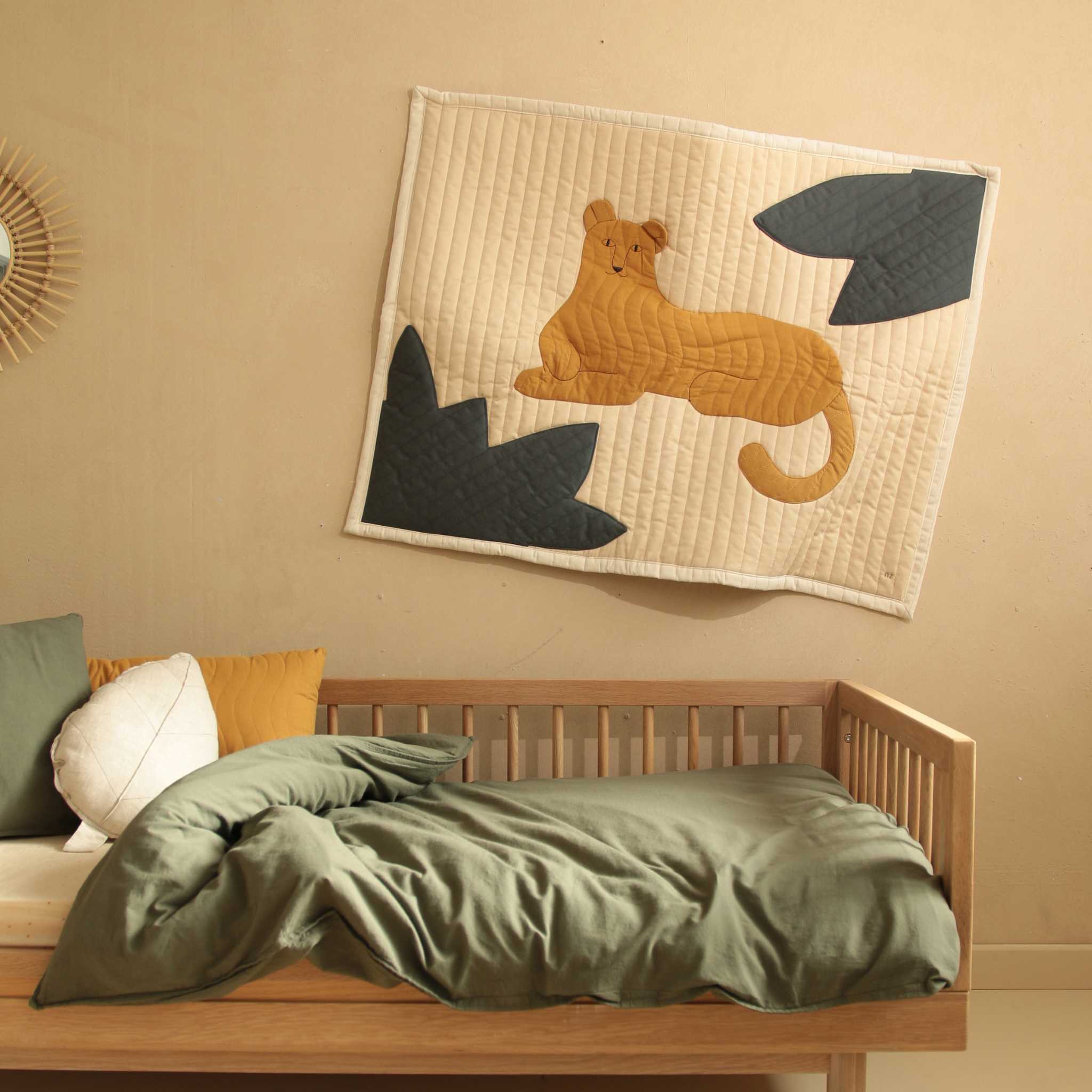Nododinoz Leopard Quilted Blanket On Wall Above Bed