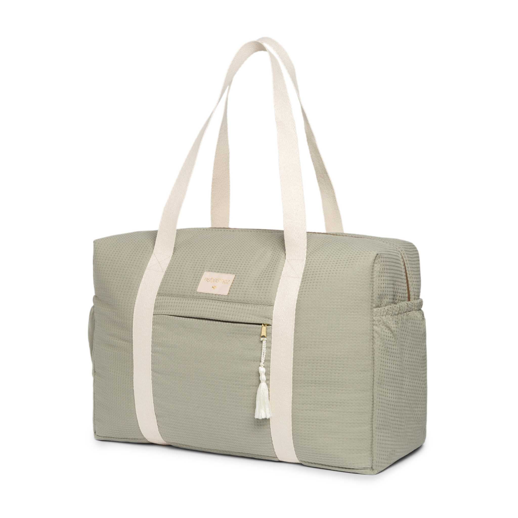 Nobodinoz Opera Changing Bag - Laurel Green -Showing full bag with handles up