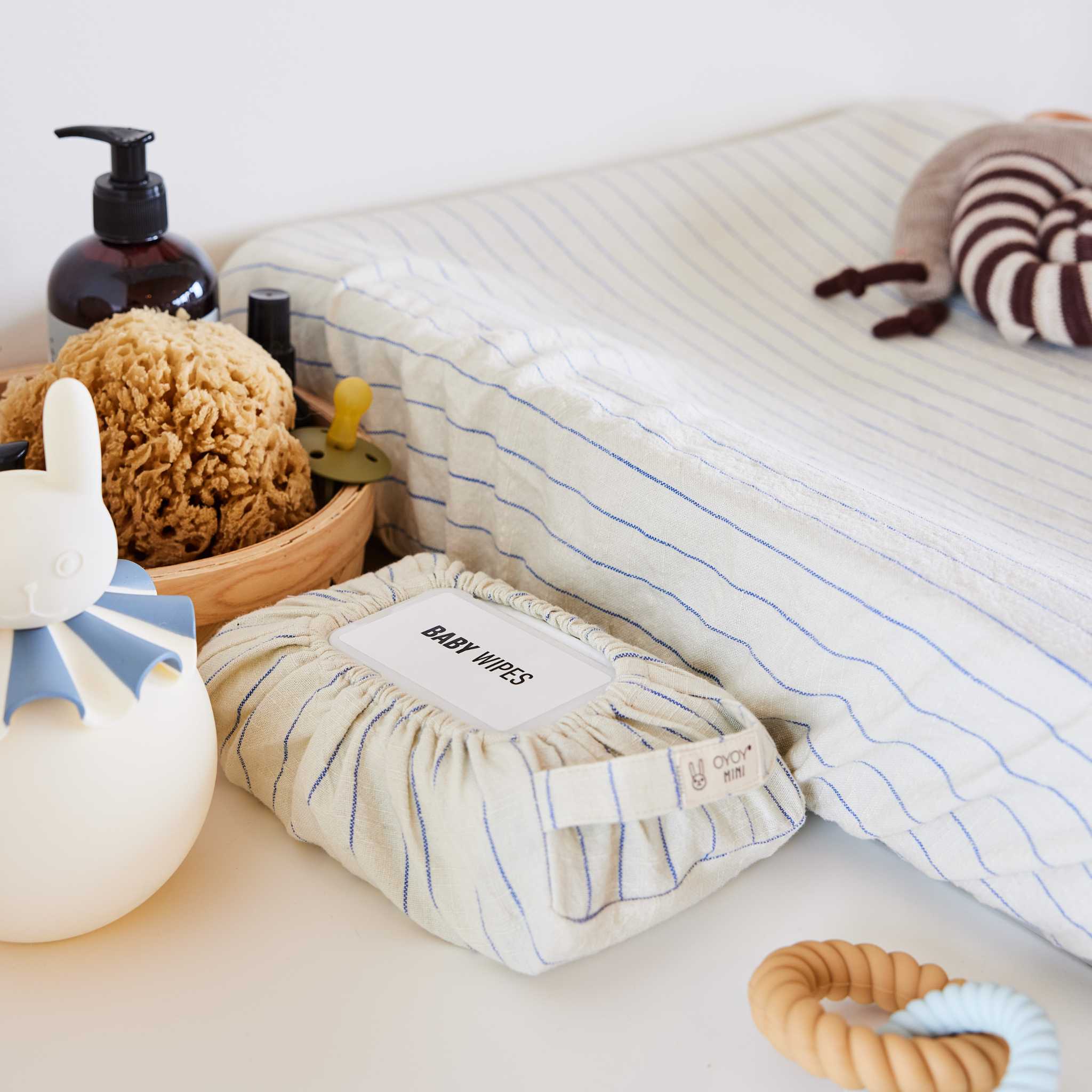 OYOY Wet Wipe Cover - Nutmeg Stripe on Changing Table