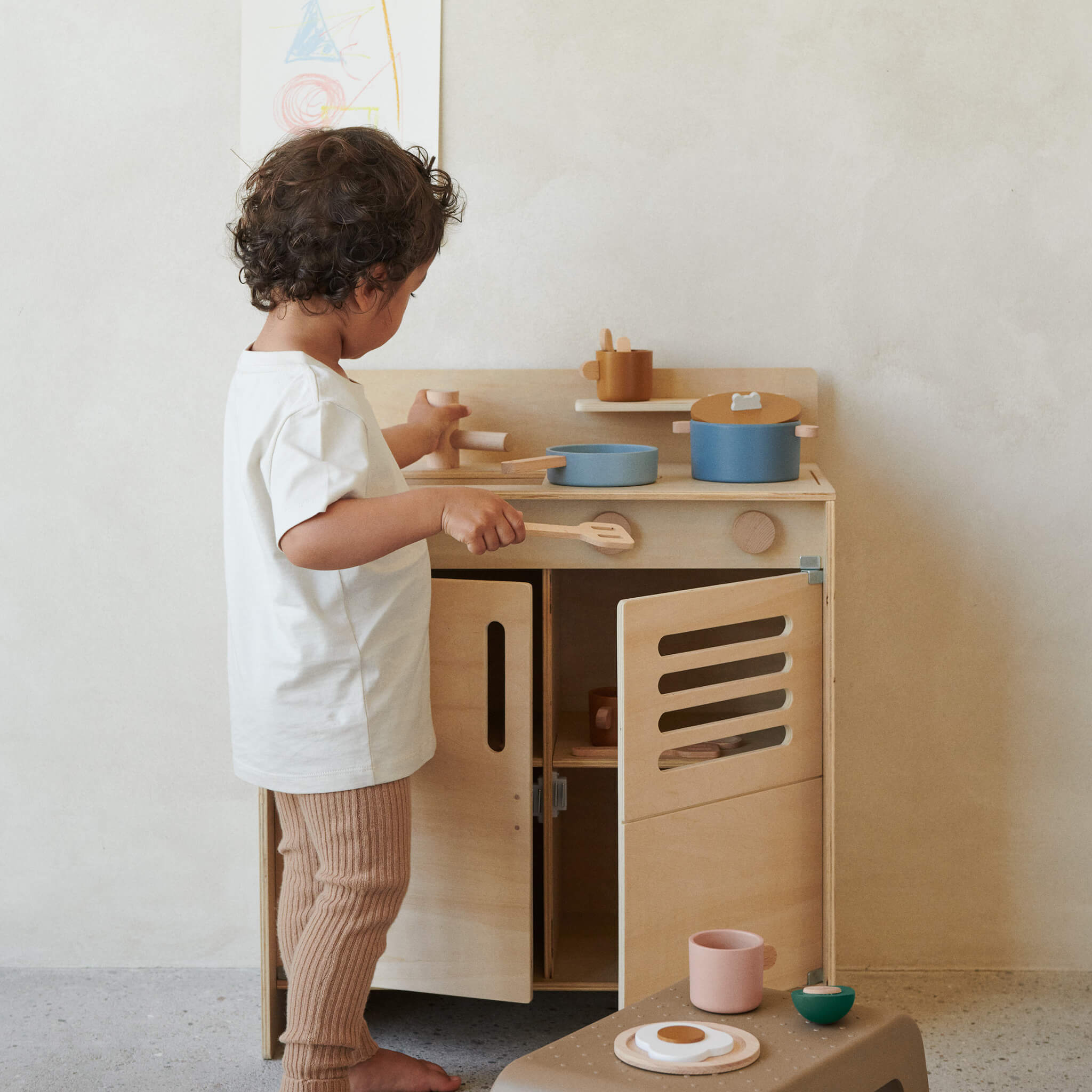 Liewood Antonio Wooden Play Cooking Set in Blue Multi Mix on Kitchen with Boy Playing