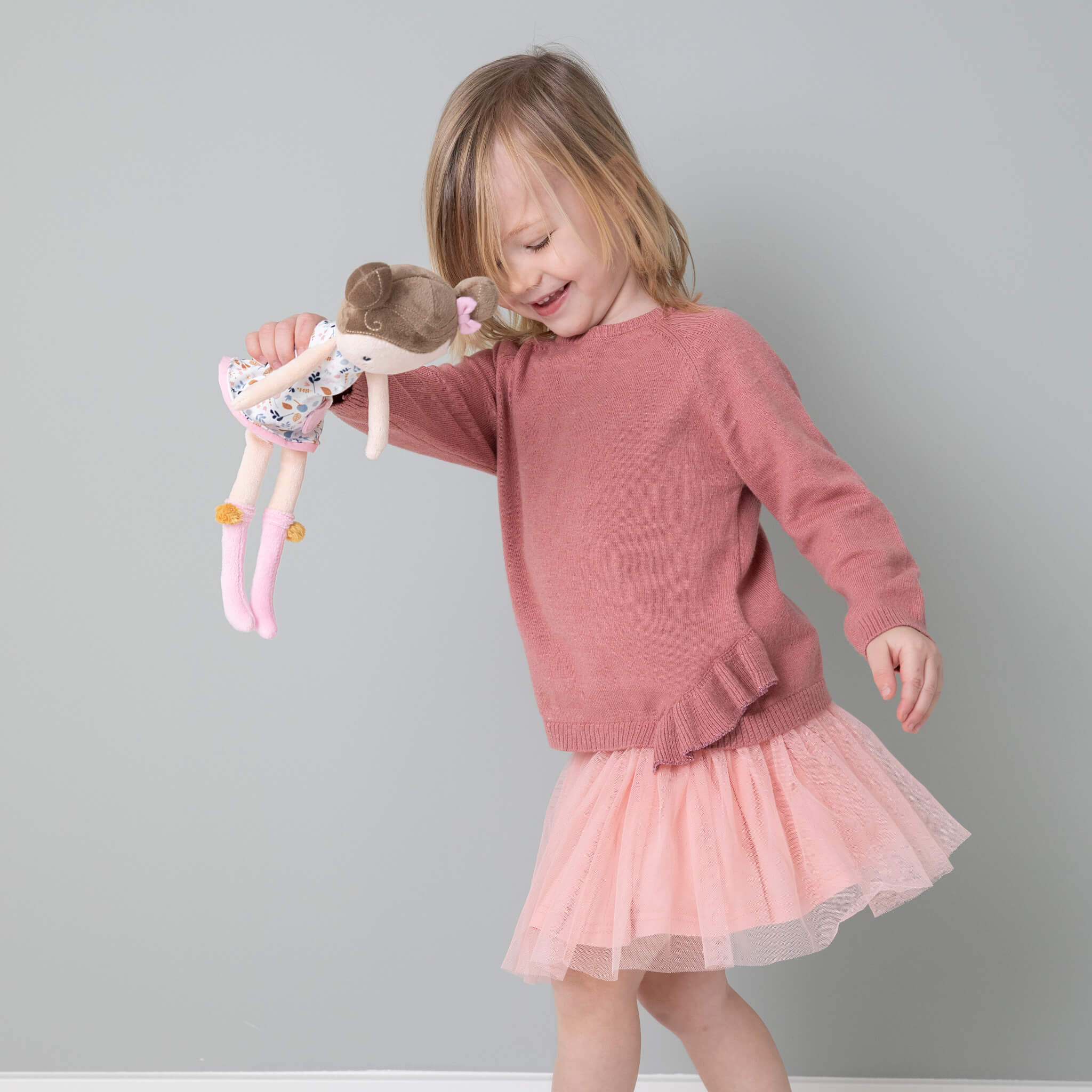 Girl with Little Dutch Cuddle Doll Rosa
