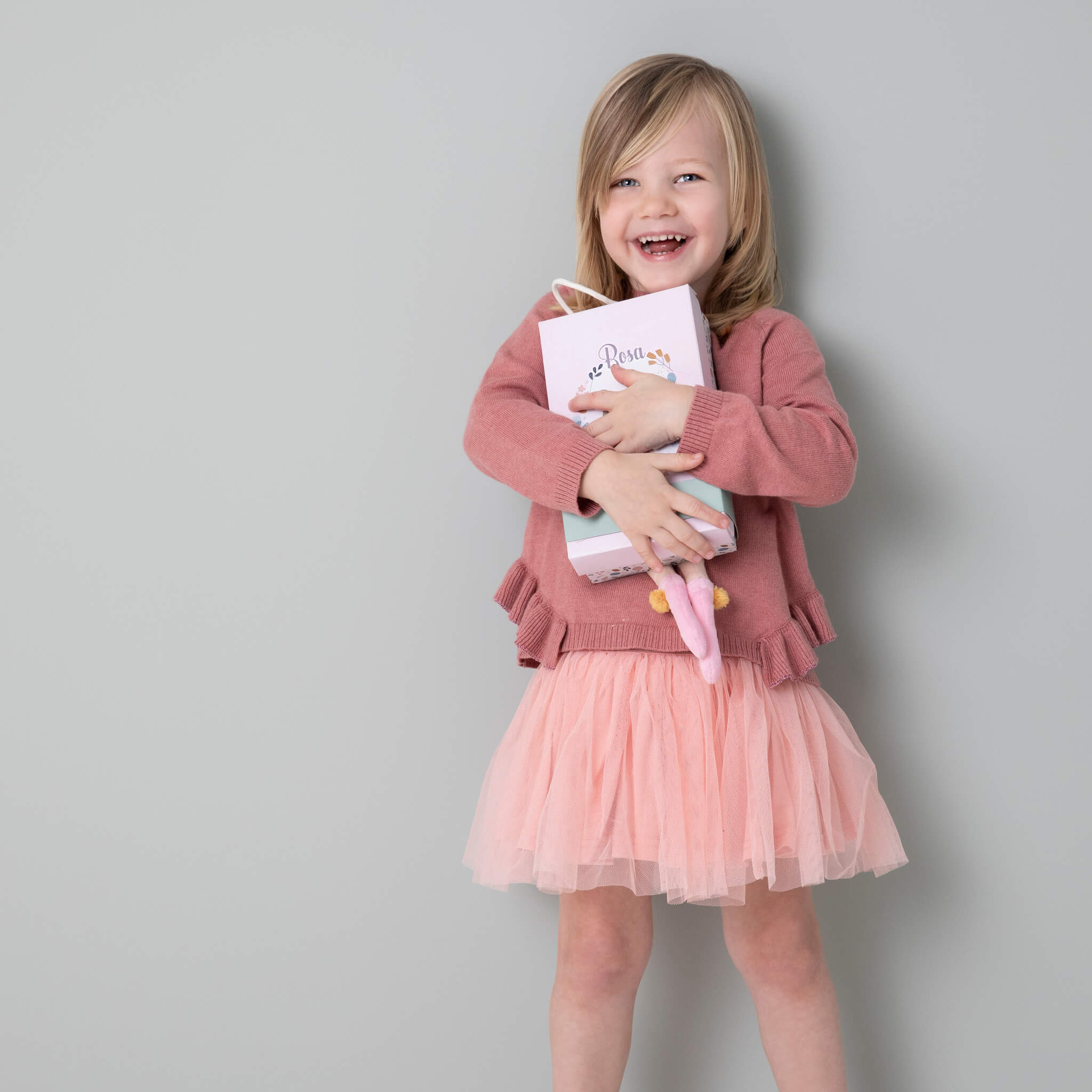 Girl with Little Dutch Cuddle Doll Rosa