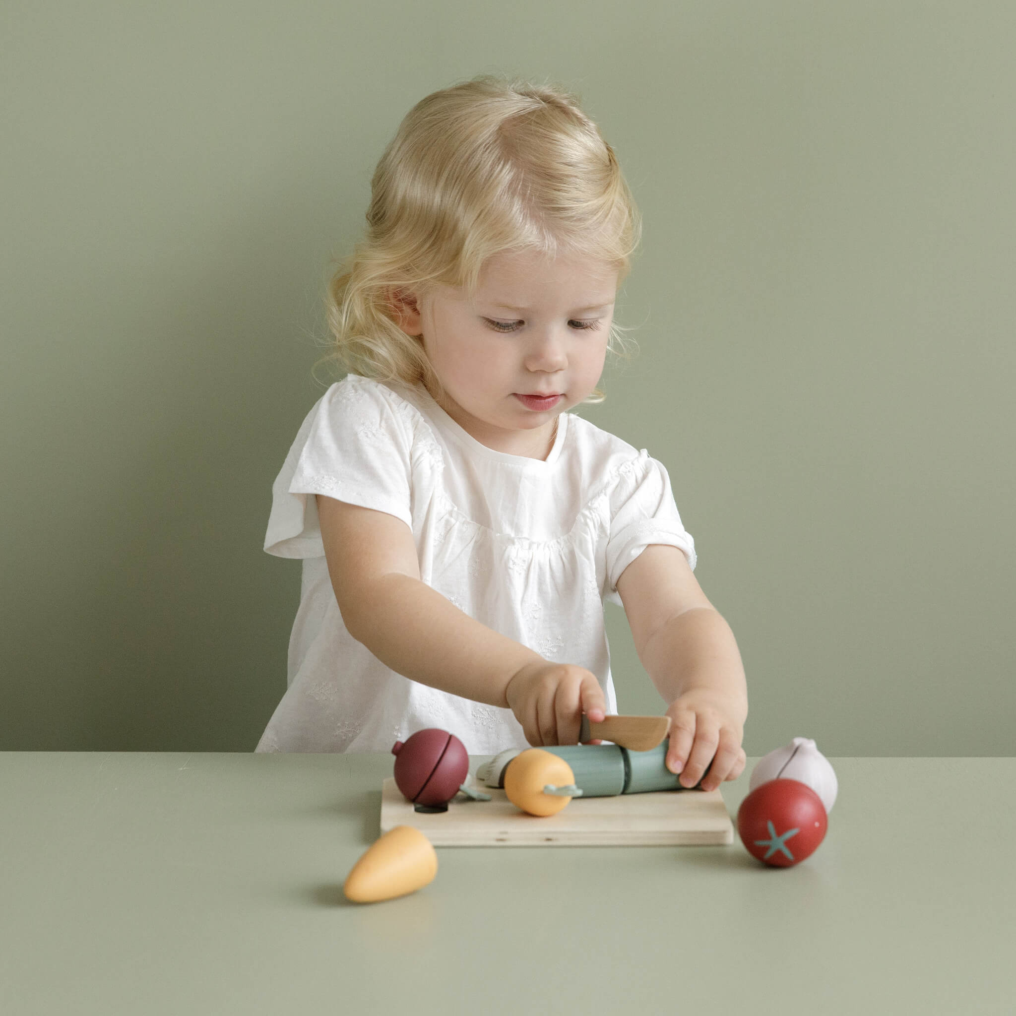 Child Playing with Little Dutch Wooden Cutting Veg Set